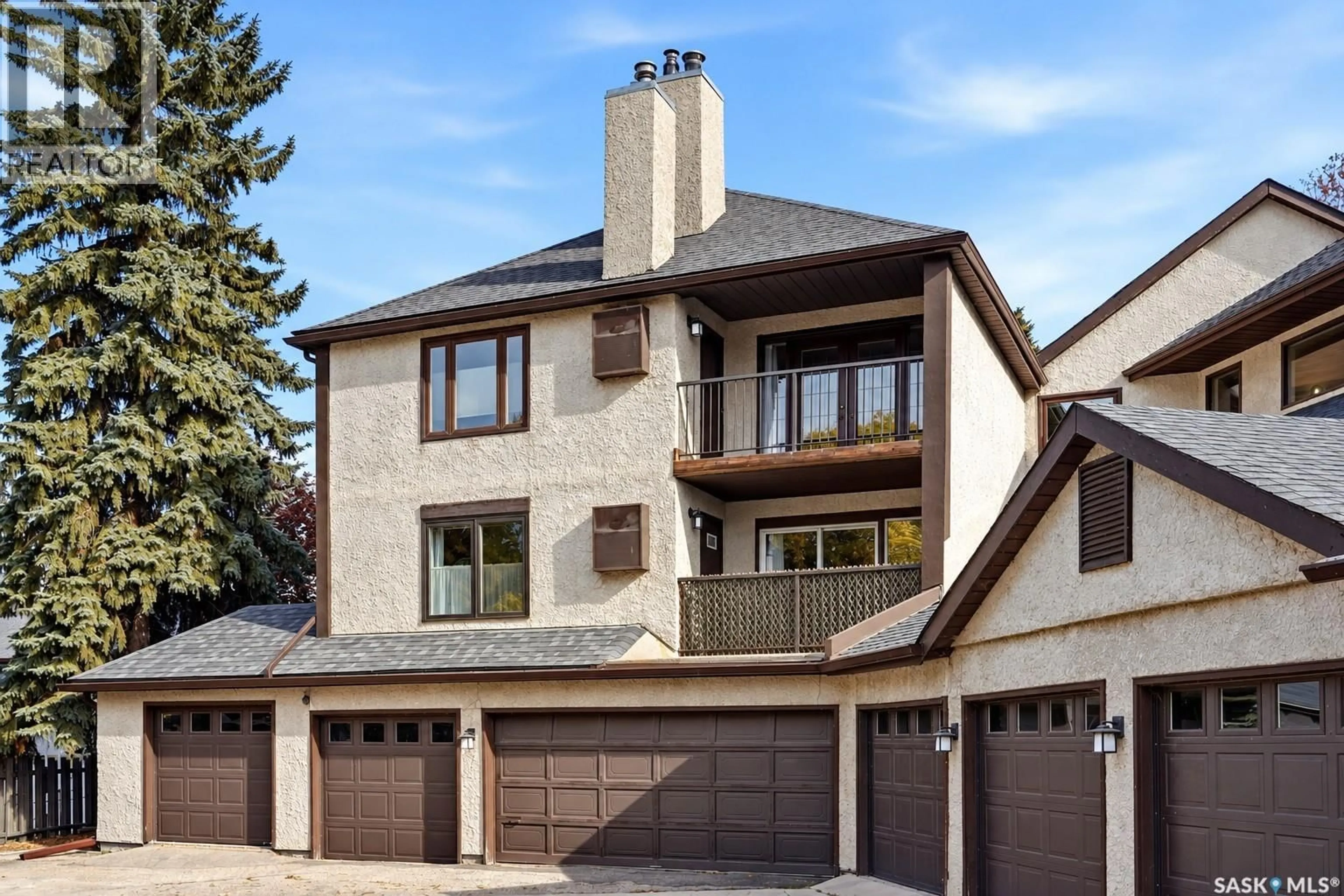 Home with brick exterior material, street for 1002 - 304 GRYPHONS WALK, Regina Saskatchewan S4S6X1