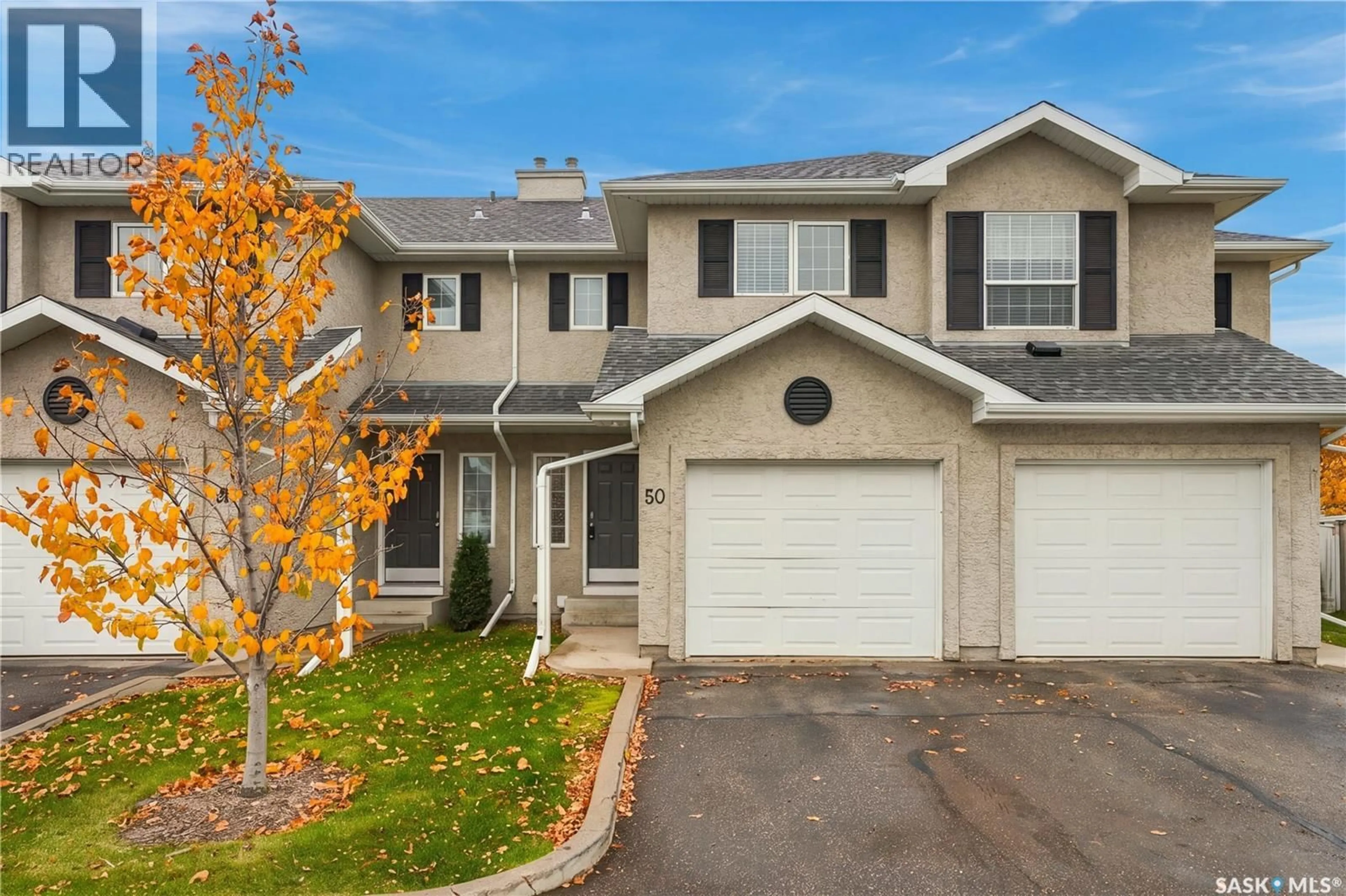 Home with vinyl exterior material, street for 50 103 BANYAN CRESCENT, Saskatoon Saskatchewan S7V1G3
