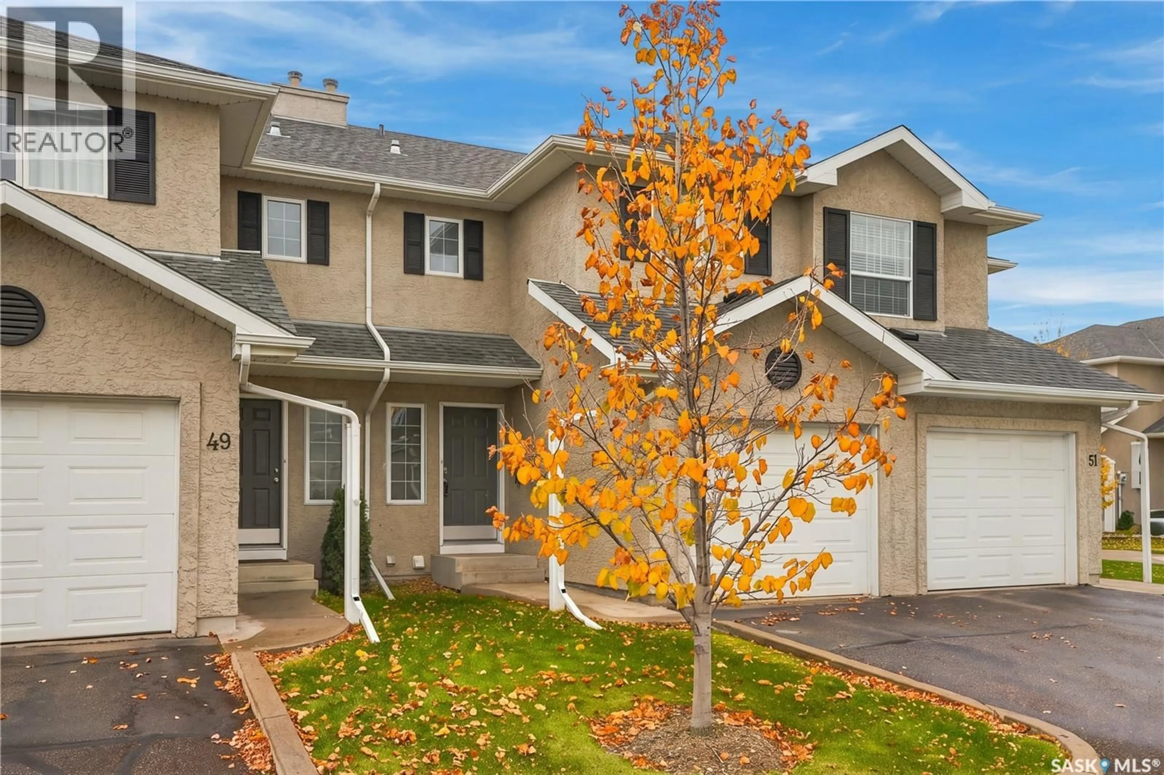Home with vinyl exterior material, street for 50 103 BANYAN CRESCENT, Saskatoon Saskatchewan S7V1G3