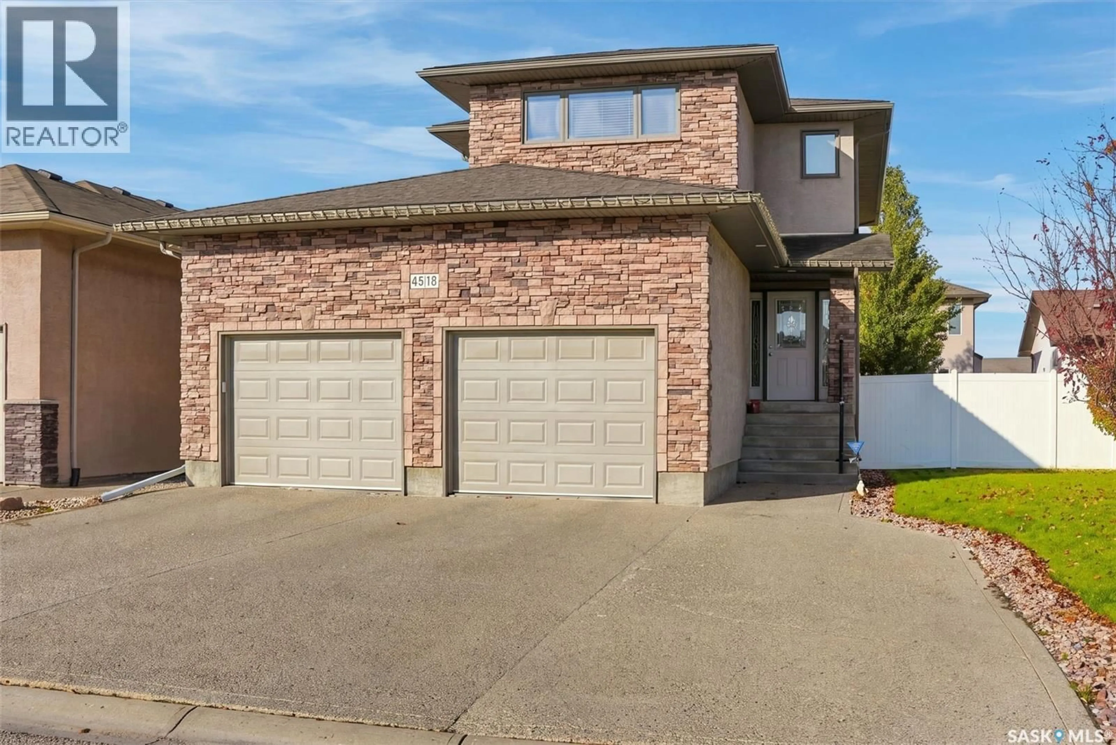 Home with brick exterior material, street for 4518 CUDMORE CRESCENT, Regina Saskatchewan S4X0B8