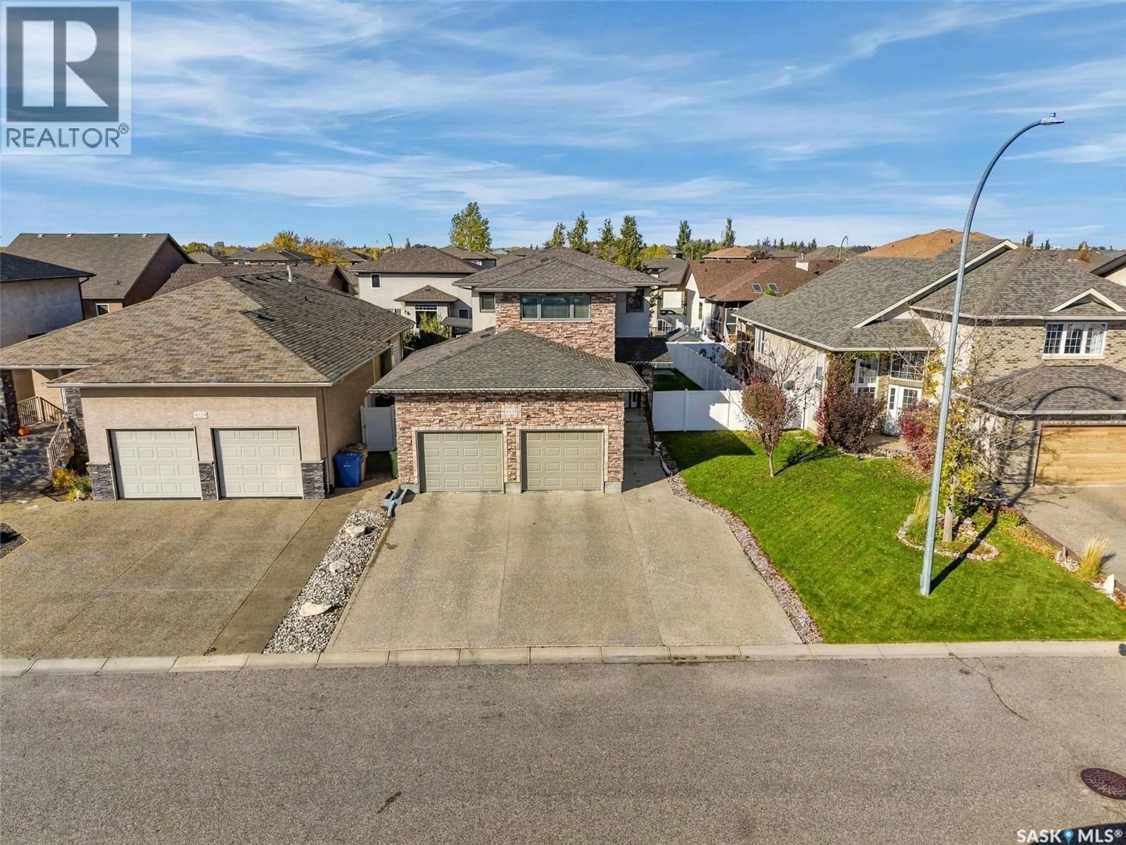 A pic from outside/outdoor area/front of a property/back of a property/a pic from drone, street for 4518 CUDMORE CRESCENT, Regina Saskatchewan S4X0B8