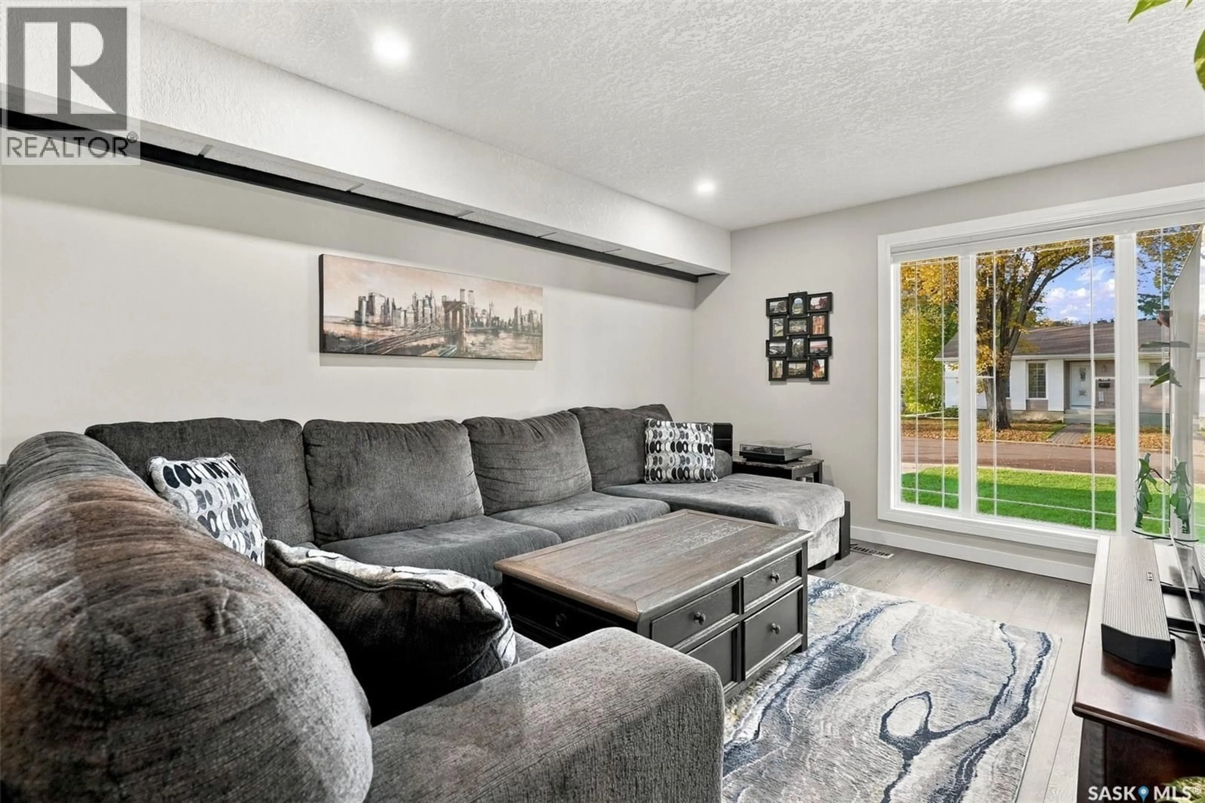 Living room with furniture, unknown for 718 SEYMOUR CRESCENT, Regina Saskatchewan S4X2G3