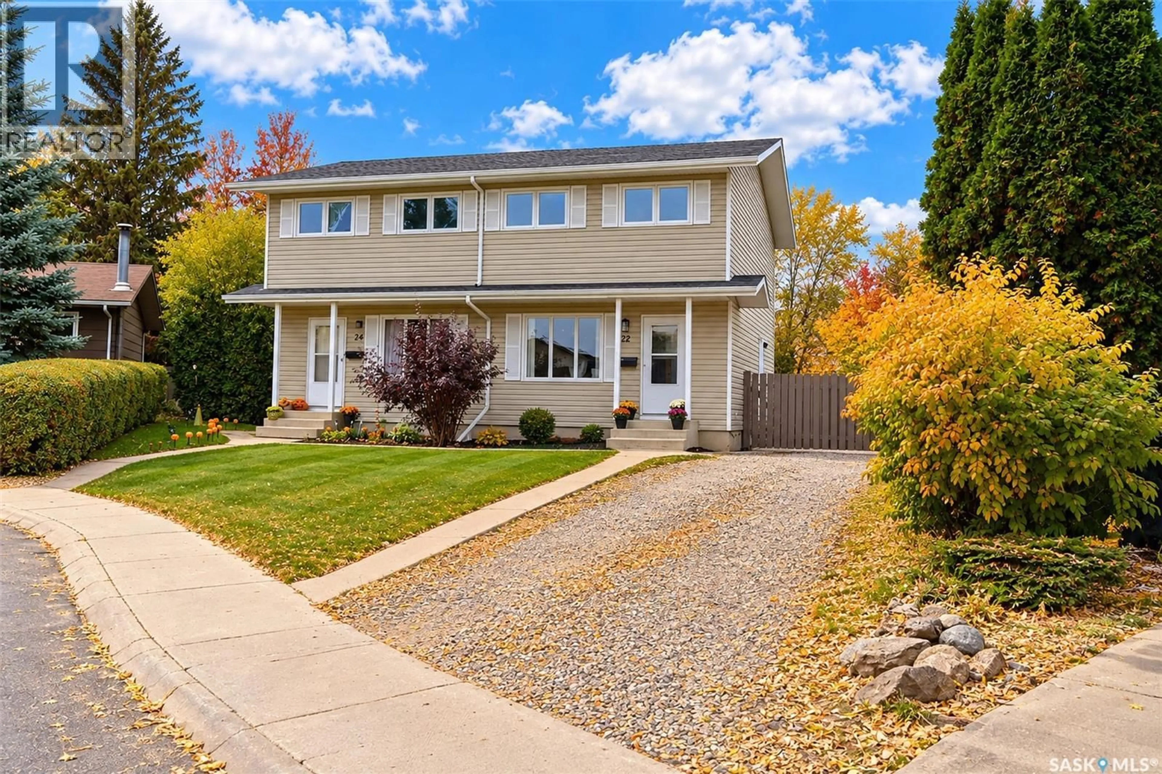 Home with vinyl exterior material, street for 22 MANITOU COURT, Saskatoon Saskatchewan S7K5G3