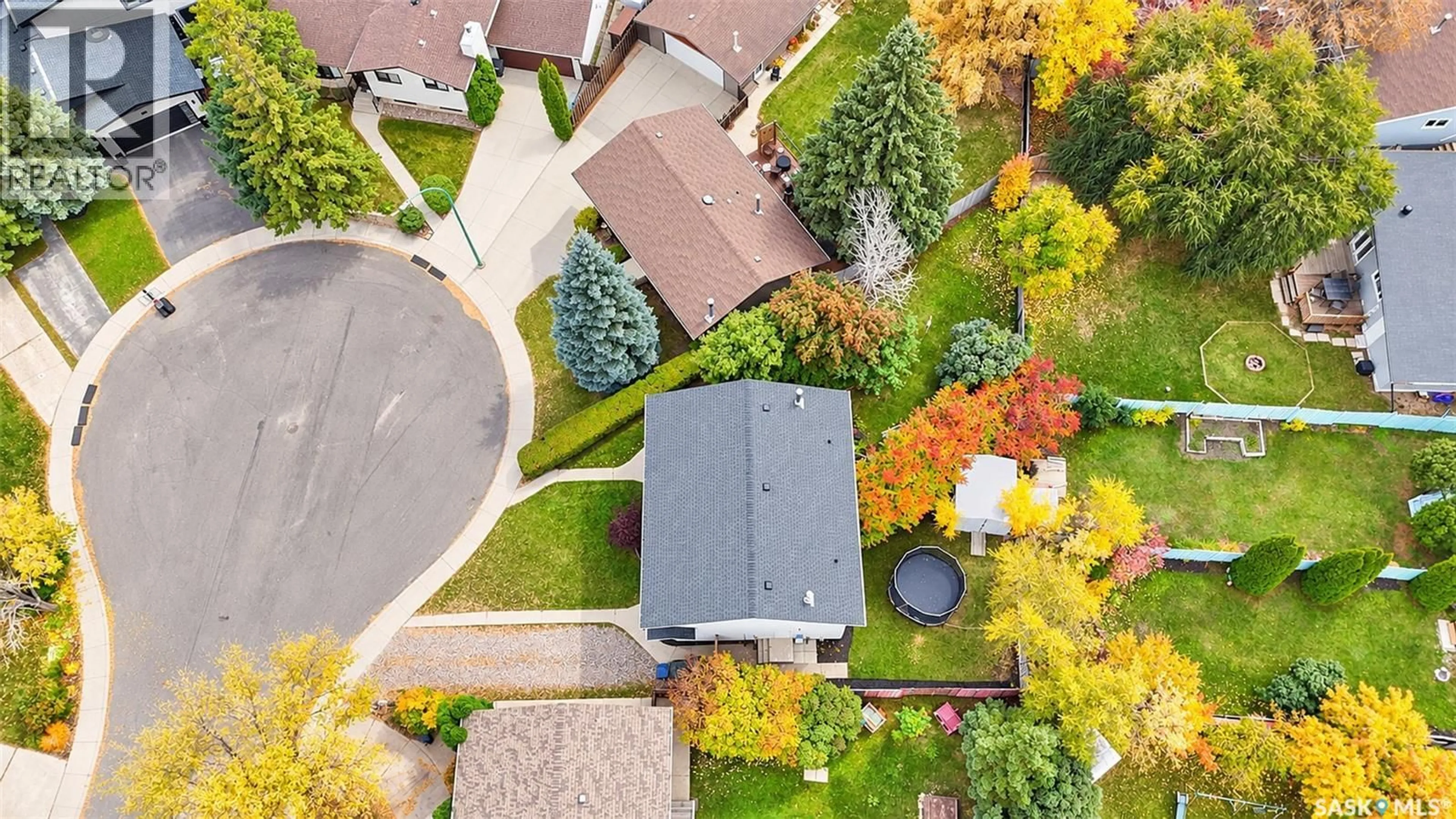A pic from outside/outdoor area/front of a property/back of a property/a pic from drone, street for 22 MANITOU COURT, Saskatoon Saskatchewan S7K5G3