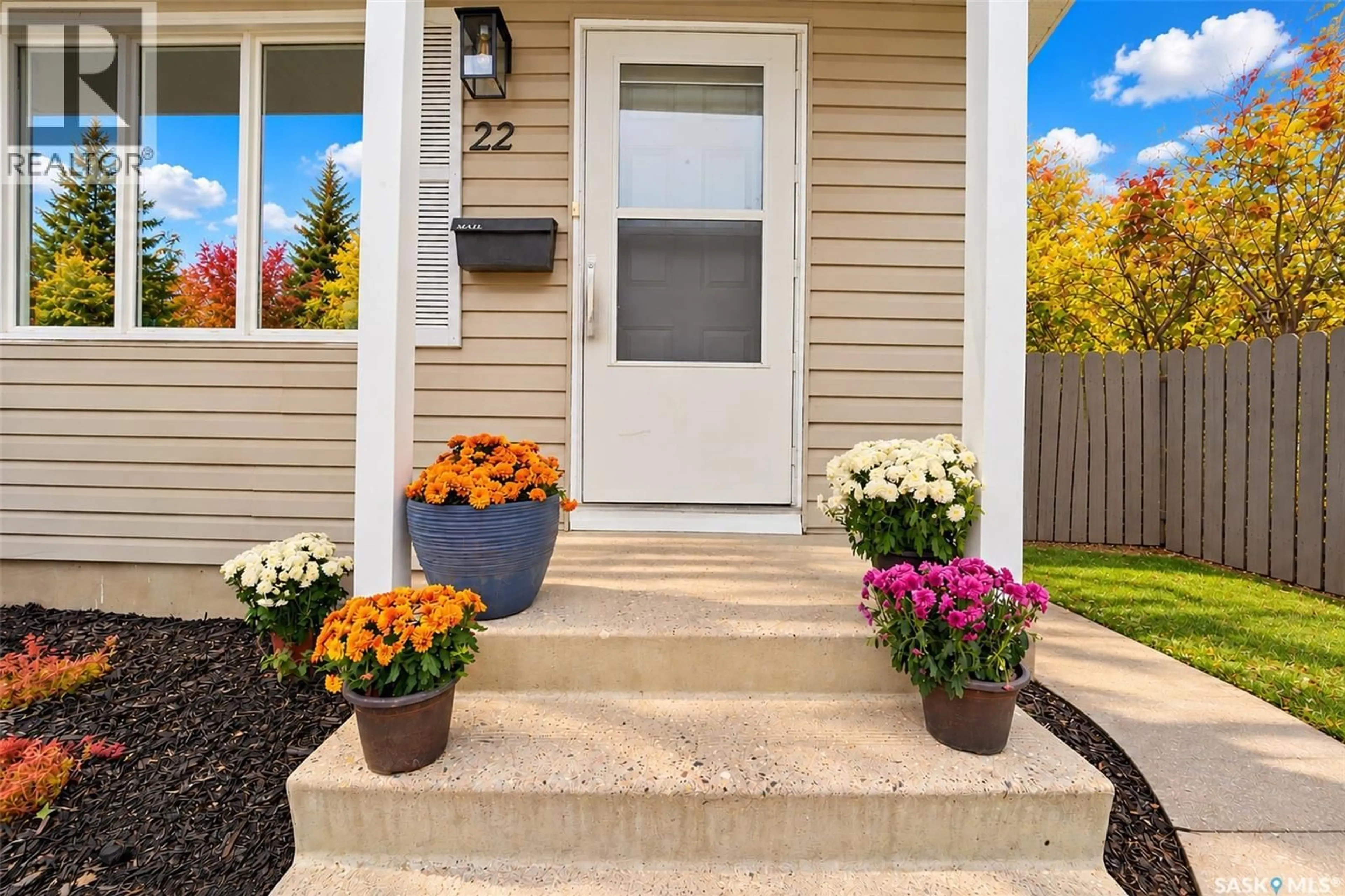 Home with vinyl exterior material, street for 22 MANITOU COURT, Saskatoon Saskatchewan S7K5G3