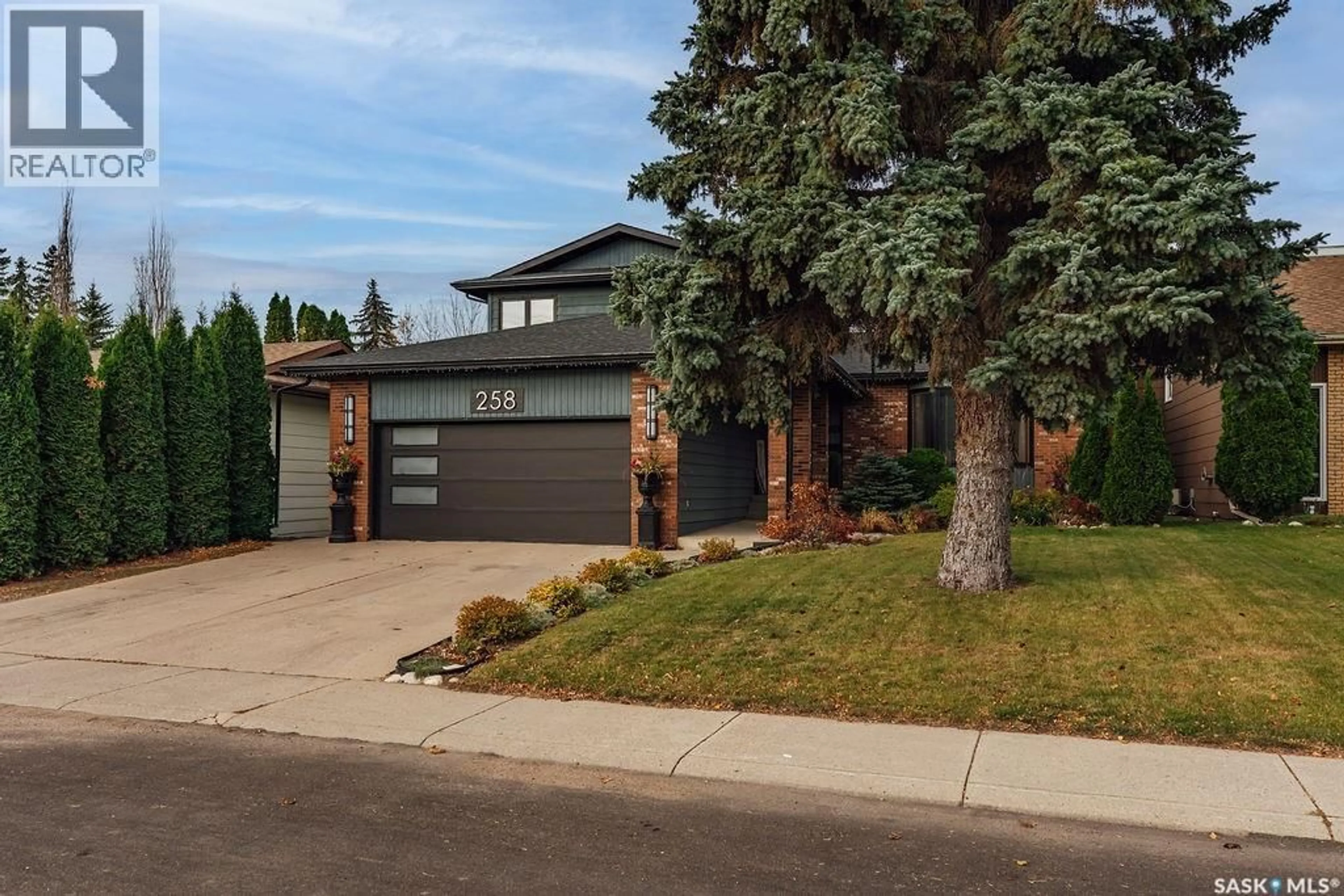 Home with brick exterior material, street for 258 AE ADAMS CRESCENT, Saskatoon Saskatchewan S7K5M9