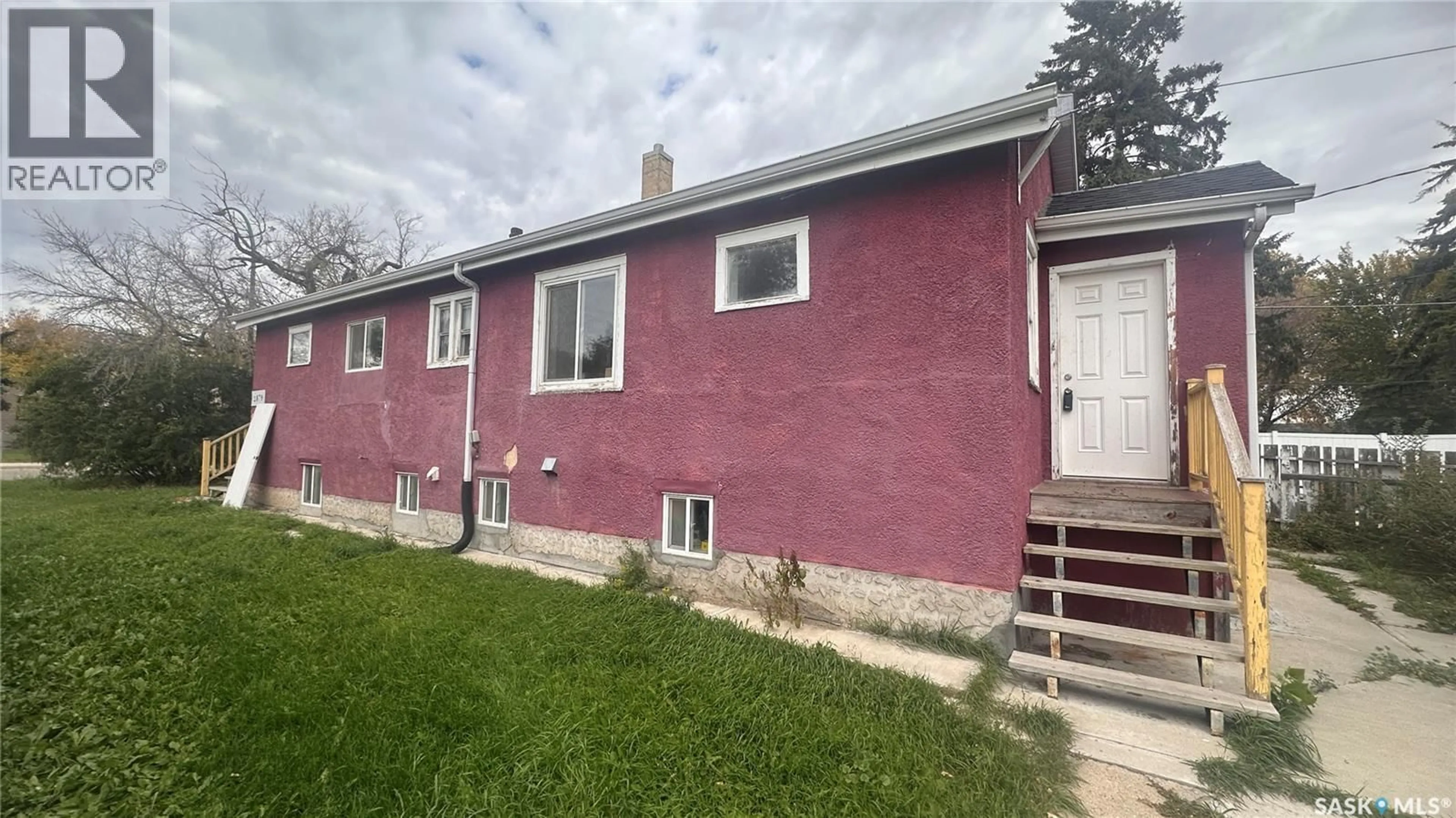 Home with vinyl exterior material, street for 1879 BRODER STREET, Regina Saskatchewan S4N3R7