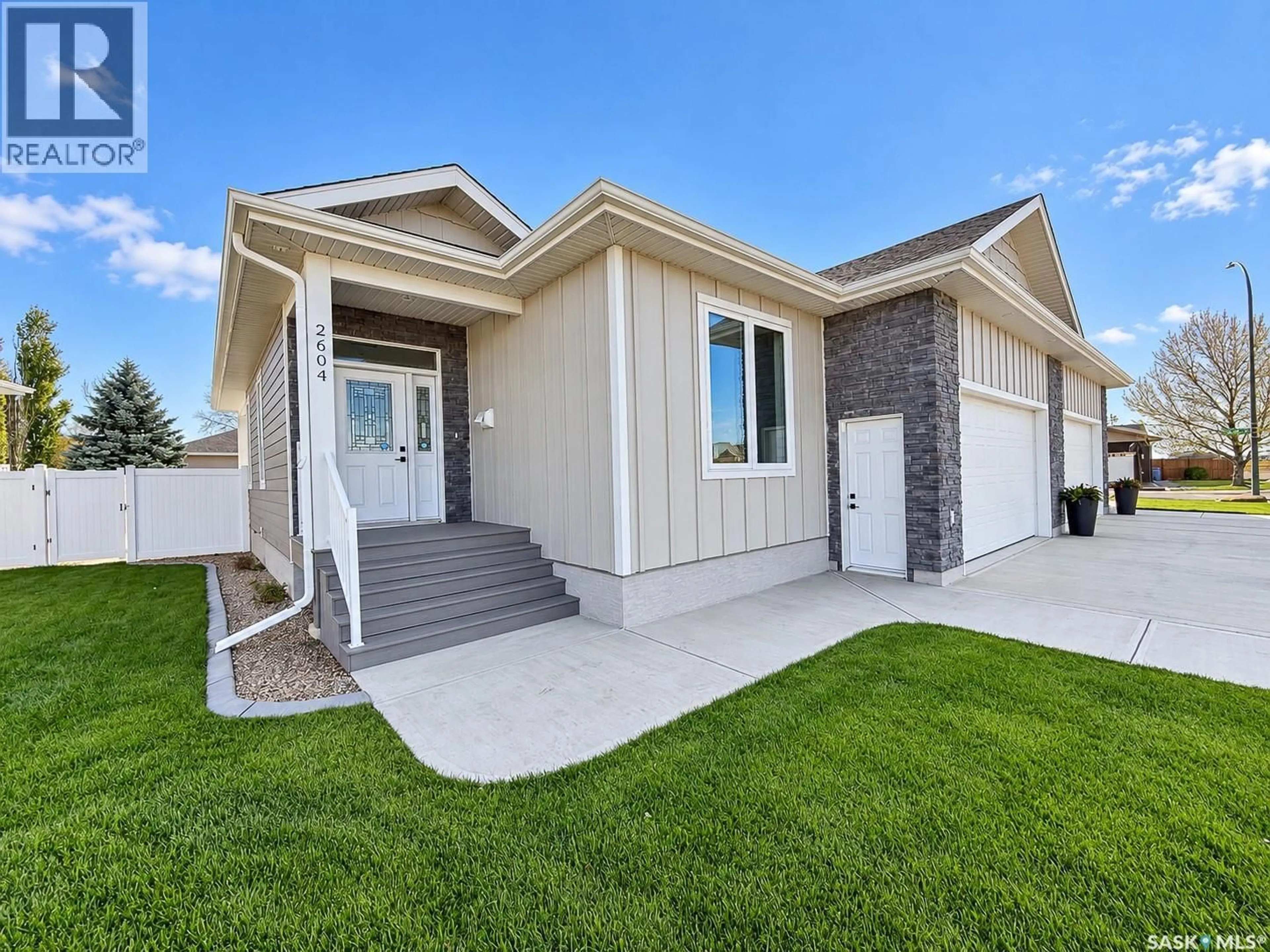 Home with vinyl exterior material, street for 2604 SANDPIPER ROAD, North Battleford Saskatchewan S9A3Z3
