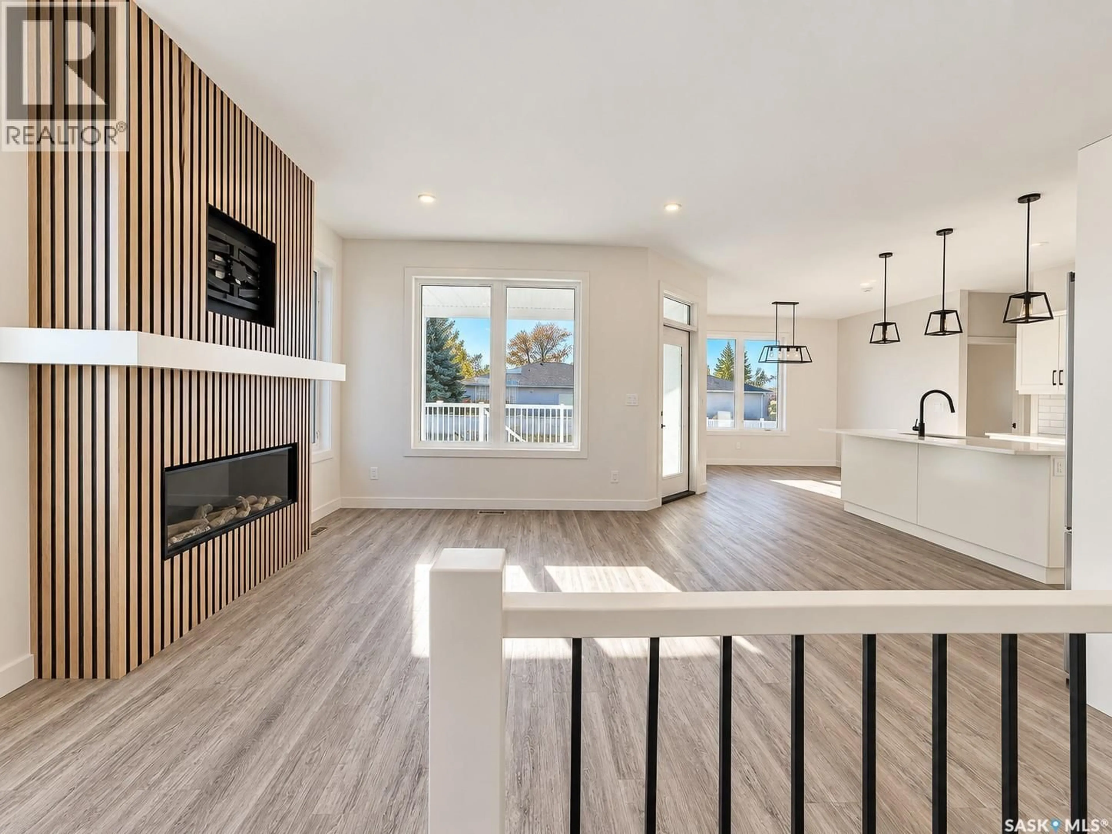 Open concept kitchen, wood/laminate floor for 2604 SANDPIPER ROAD, North Battleford Saskatchewan S9A3Z3