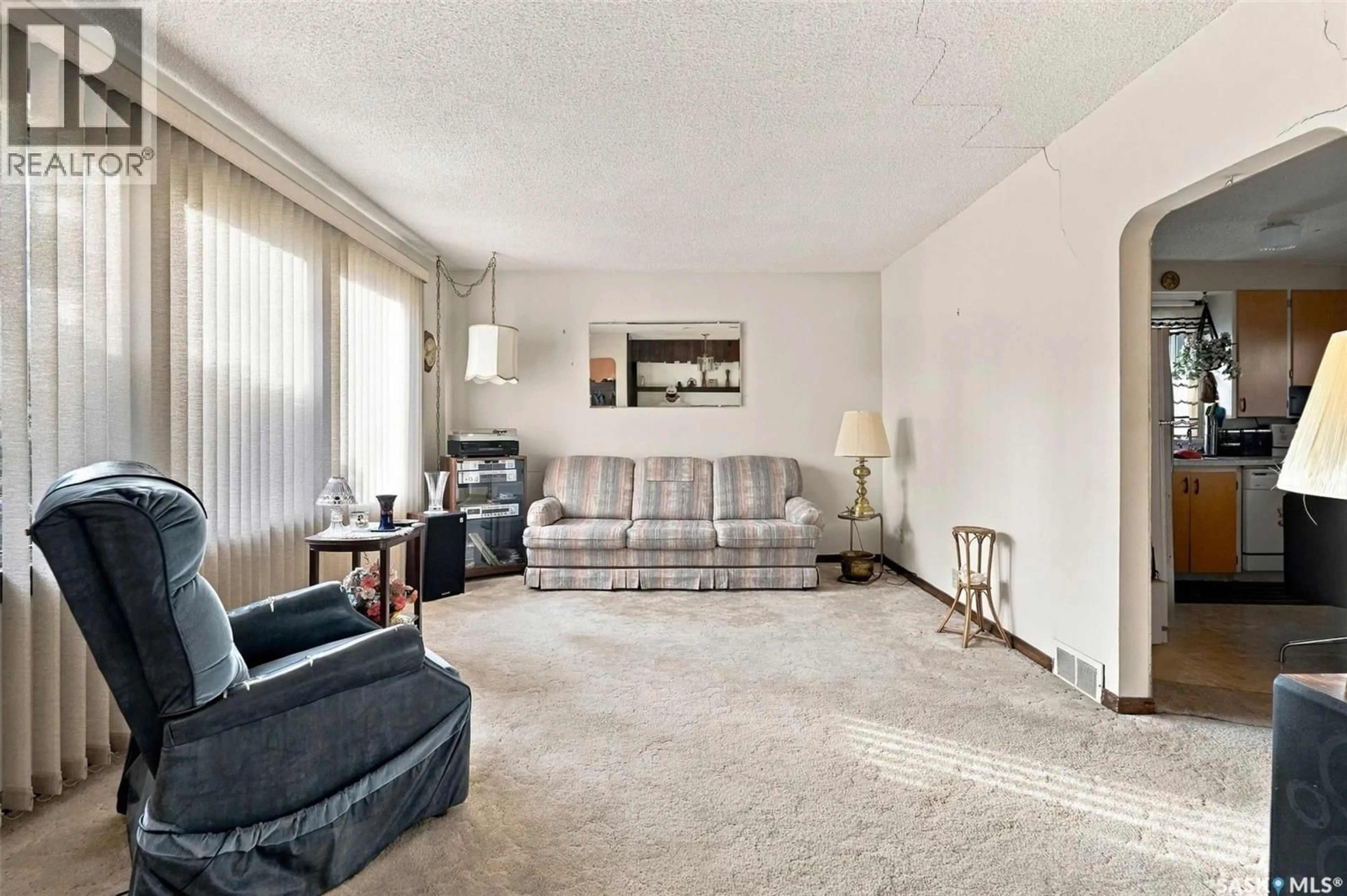 Living room with furniture, carpet floor for 3030 ELPHINSTONE STREET, Regina Saskatchewan S4S2A5
