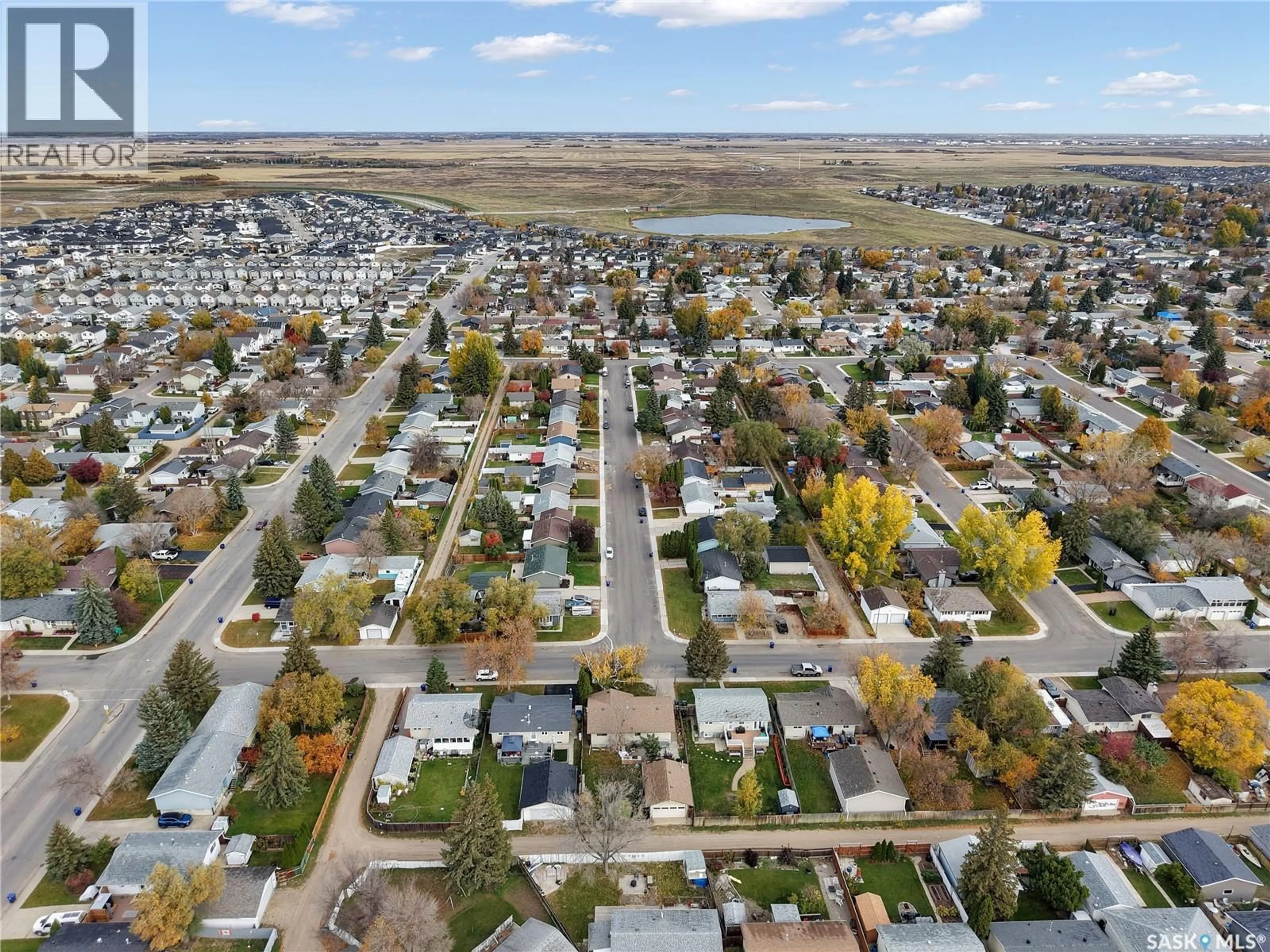 A pic from outside/outdoor area/front of a property/back of a property/a pic from drone, street for 106 SHEA CRESCENT, Saskatoon Saskatchewan S7L5M1