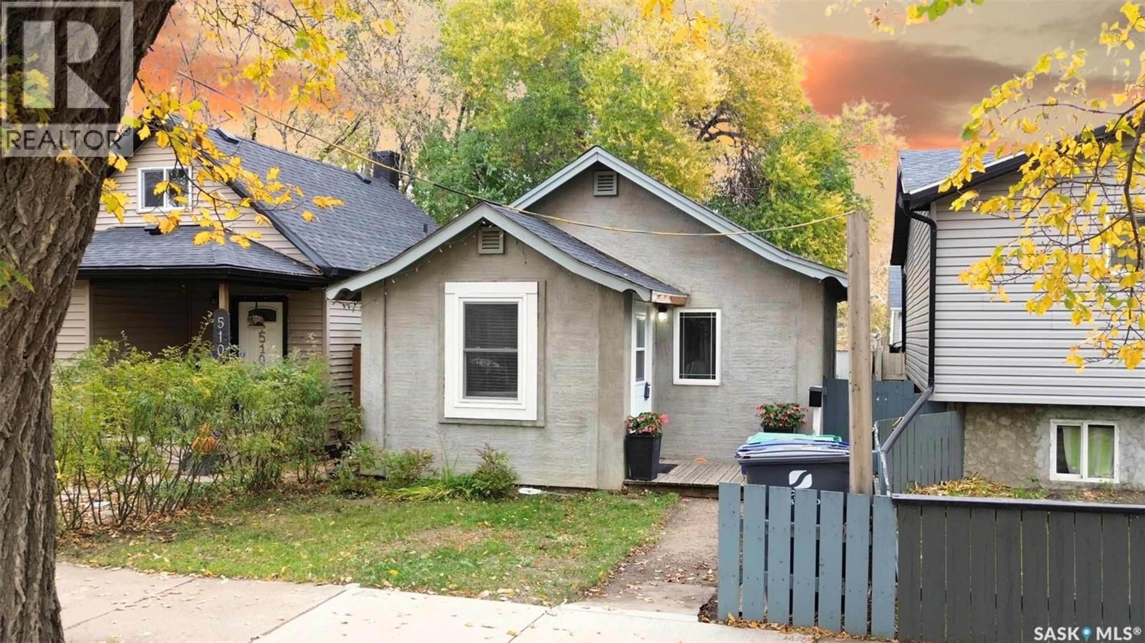 Home with vinyl exterior material, street for 512 J AVENUE, Saskatoon Saskatchewan S7M2A8
