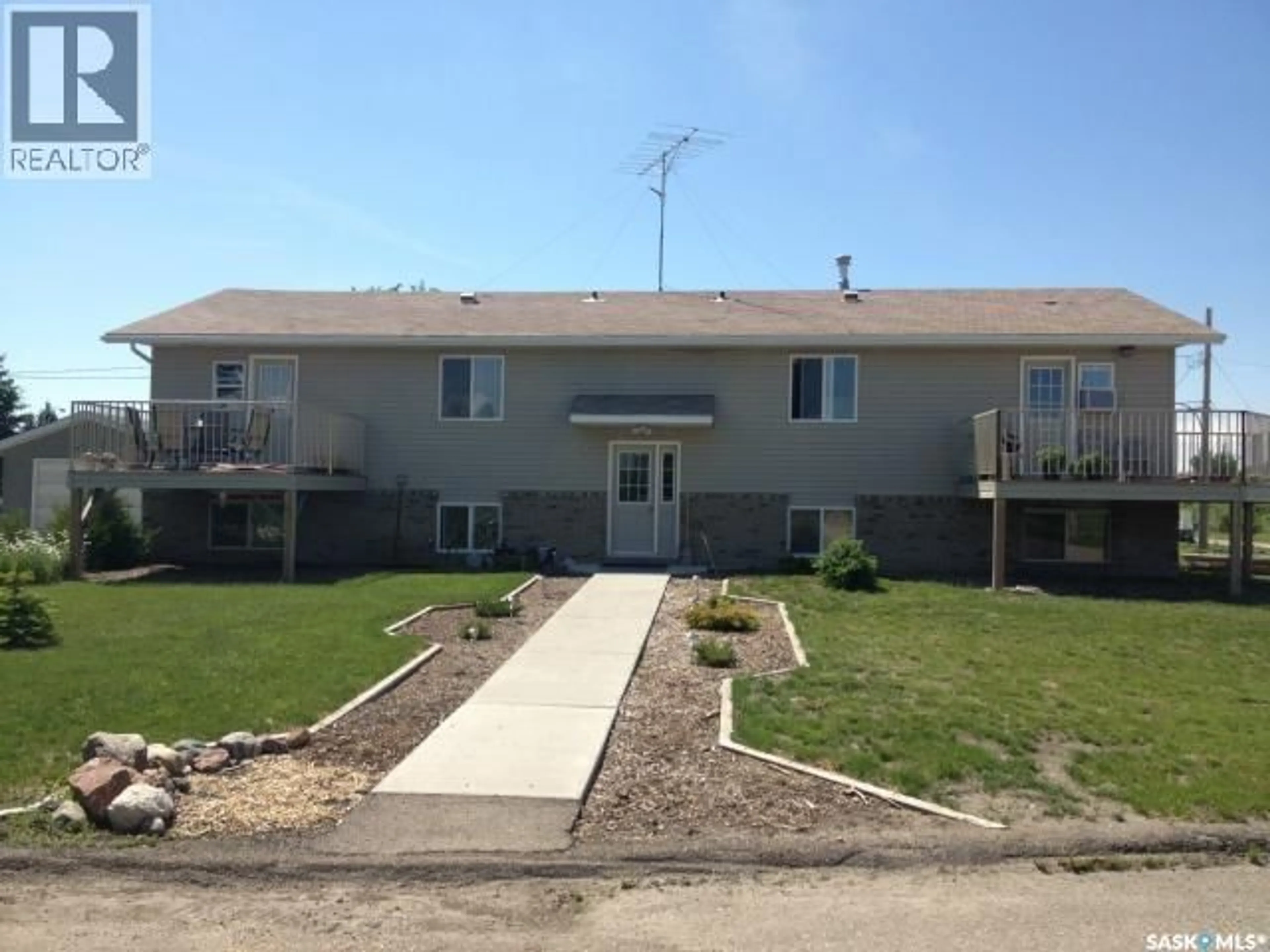 A pic from outside/outdoor area/front of a property/back of a property/a pic from drone, building for 245 3RD STREET, Wadena Saskatchewan S0A4J0
