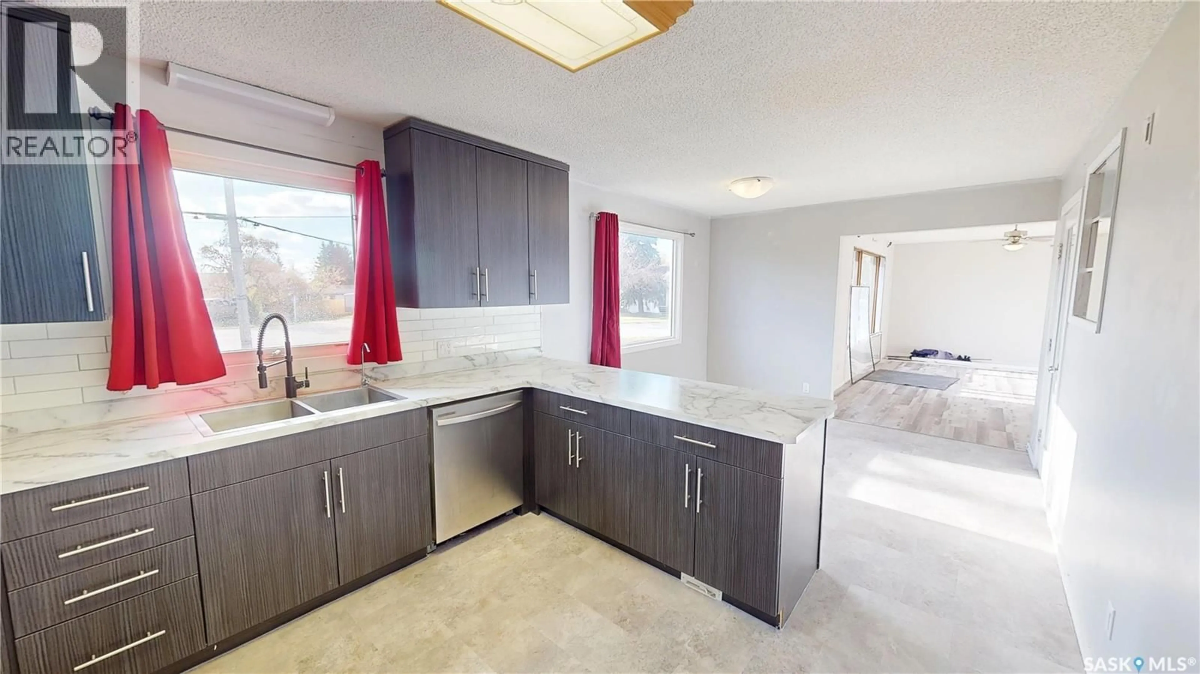 Open concept kitchen, ceramic/tile floor for 402 MAIN STREET, Arcola Saskatchewan S0C0G0