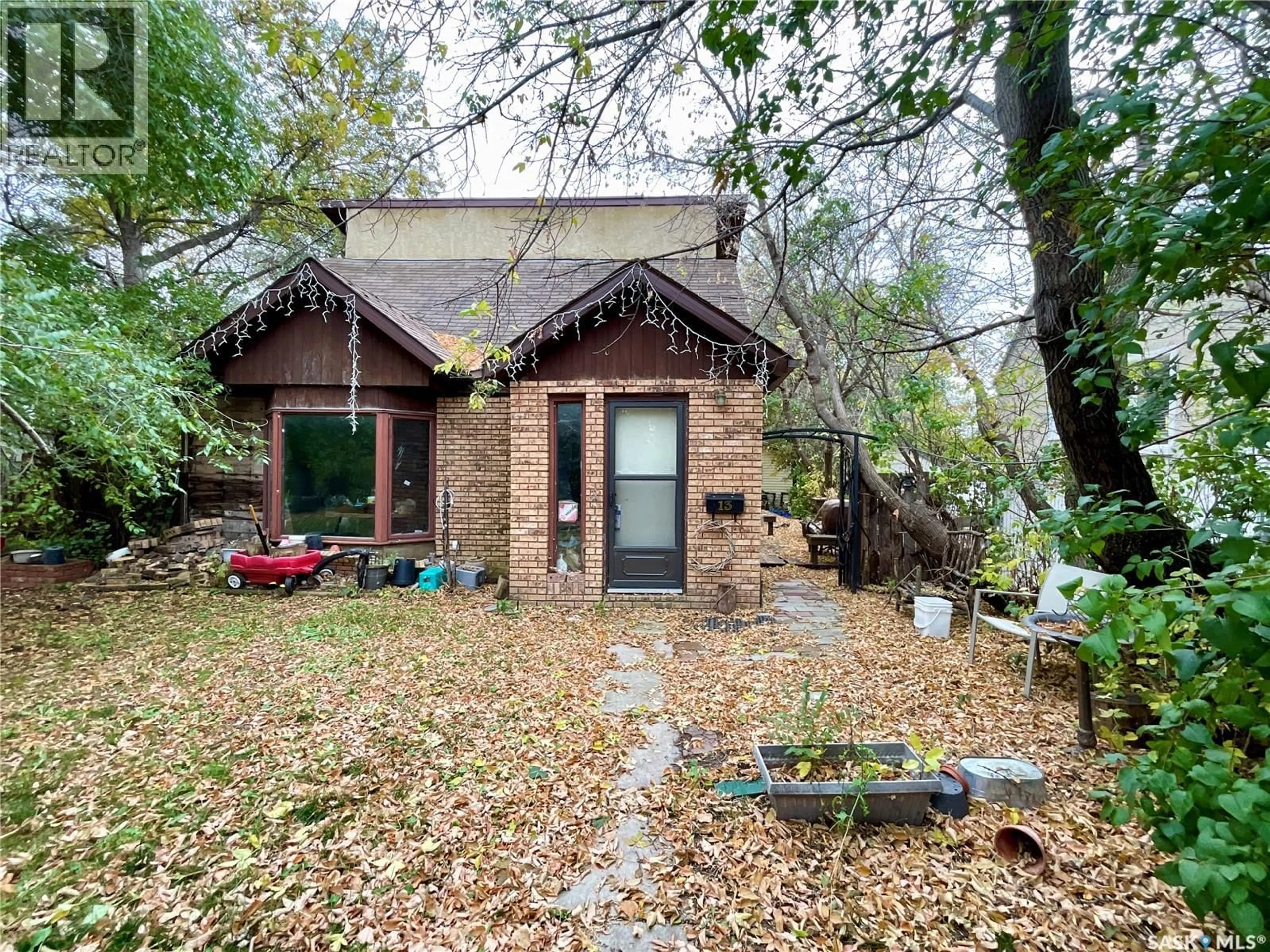 Home with brick exterior material, unknown for 13 MERRITT CRESCENT, Regina Saskatchewan S4T5X9