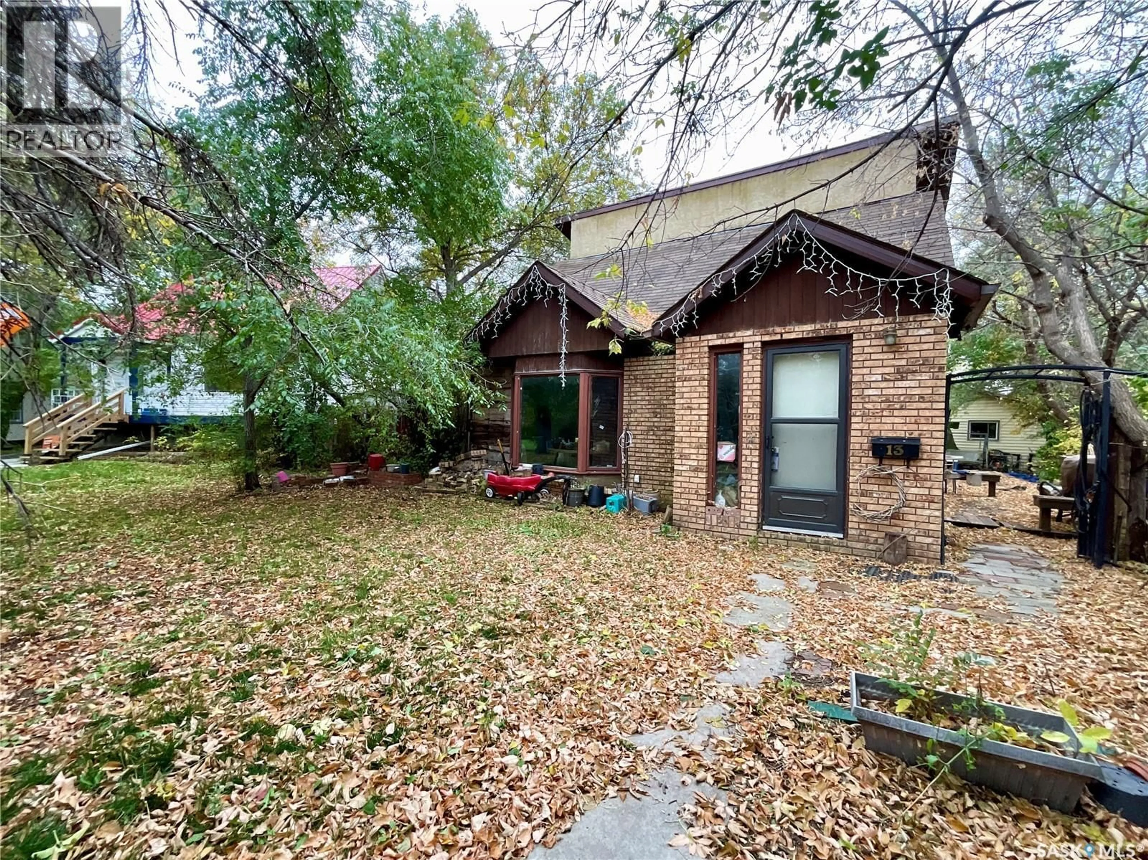 Home with brick exterior material, street for 13 MERRITT CRESCENT, Regina Saskatchewan S4T5X9