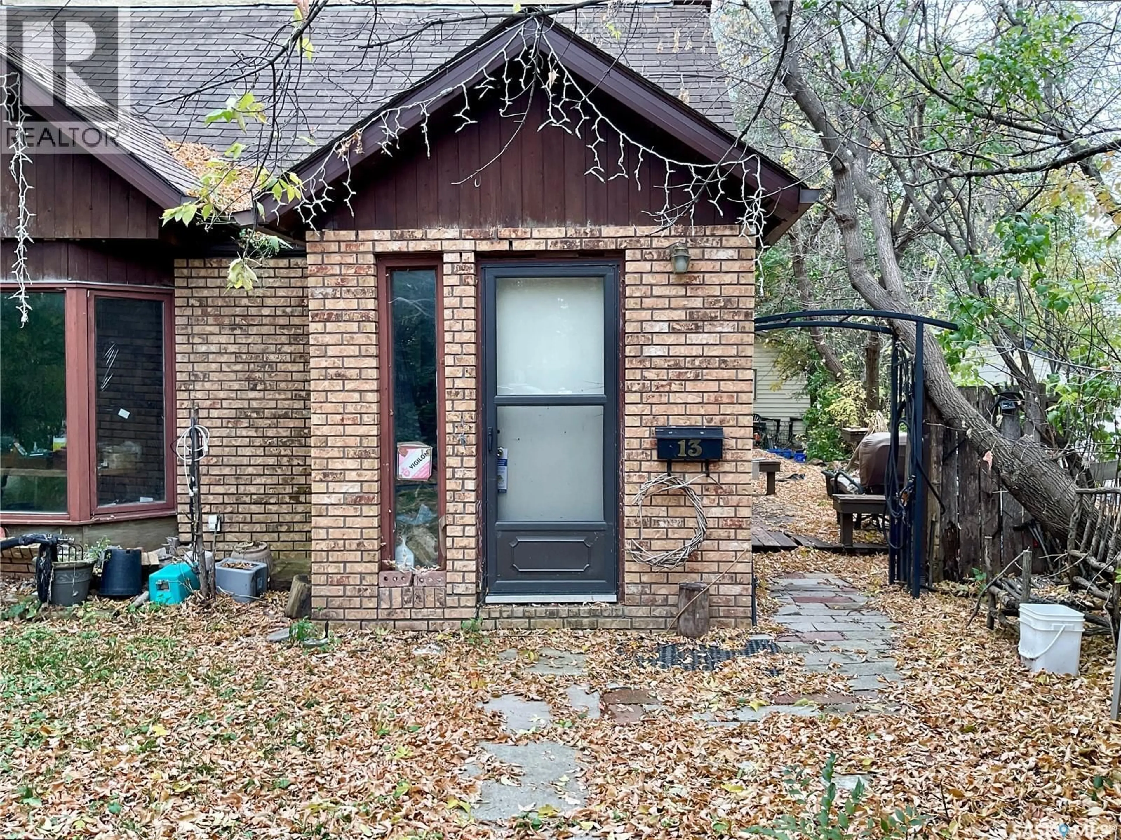 Home with brick exterior material, street for 13 MERRITT CRESCENT, Regina Saskatchewan S4T5X9