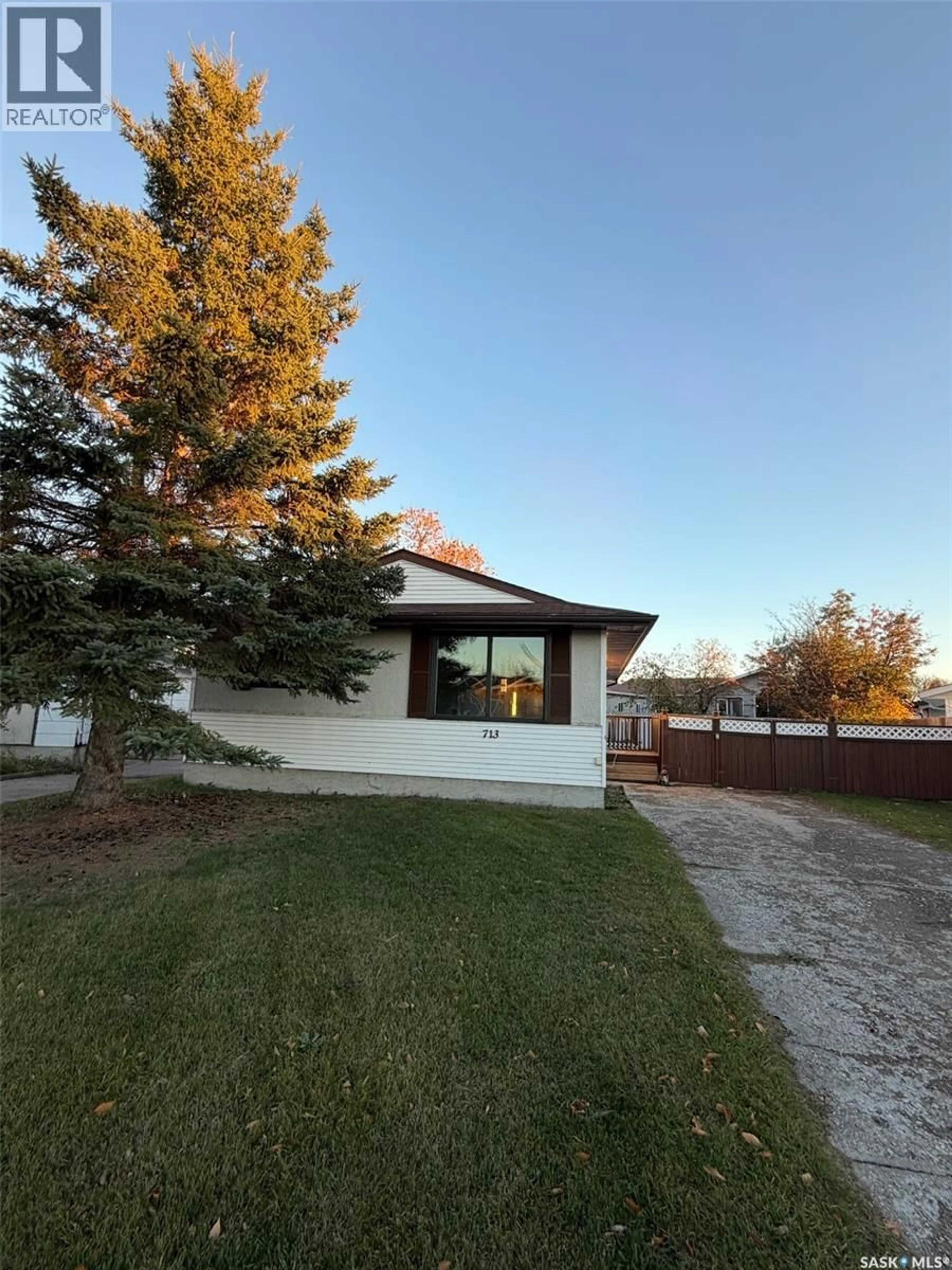 A pic from outside/outdoor area/front of a property/back of a property/a pic from drone, unknown for 713 BIRCH CRESCENT, Hudson Bay Saskatchewan S0E0Y0