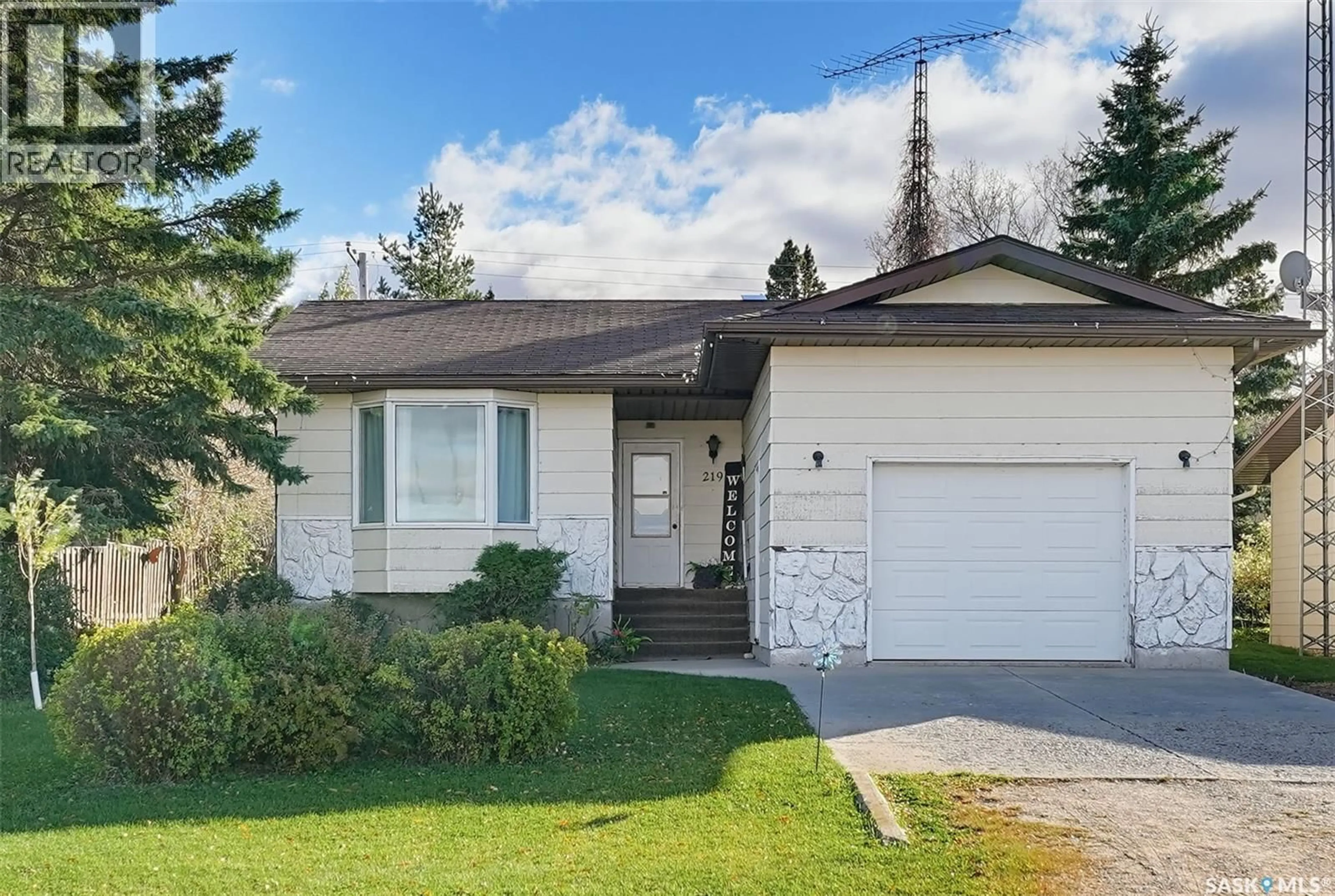 Home with vinyl exterior material, street for 219 HAWKINS STREET, Drake Saskatchewan S0K1H0