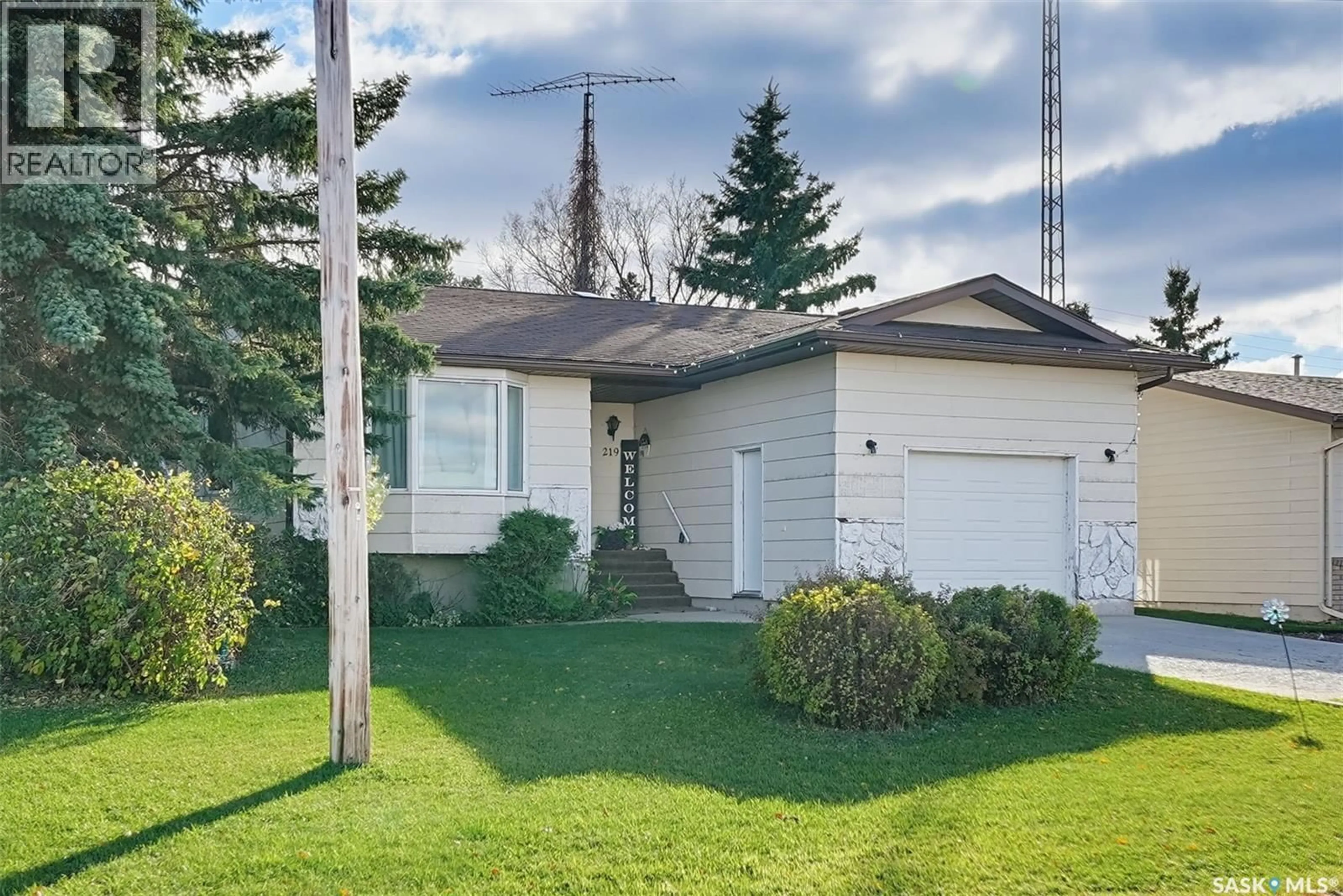 Home with vinyl exterior material, street for 219 HAWKINS STREET, Drake Saskatchewan S0K1H0