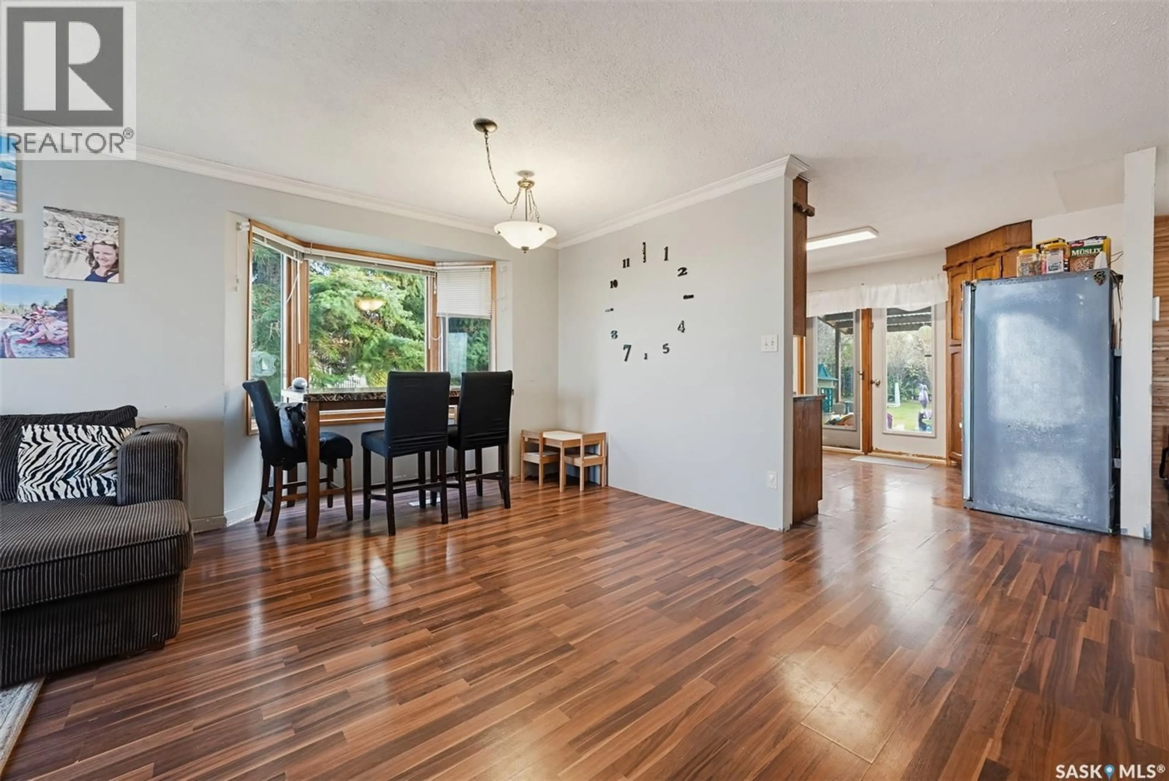 Dining room, wood/laminate floor for 219 HAWKINS STREET, Drake Saskatchewan S0K1H0