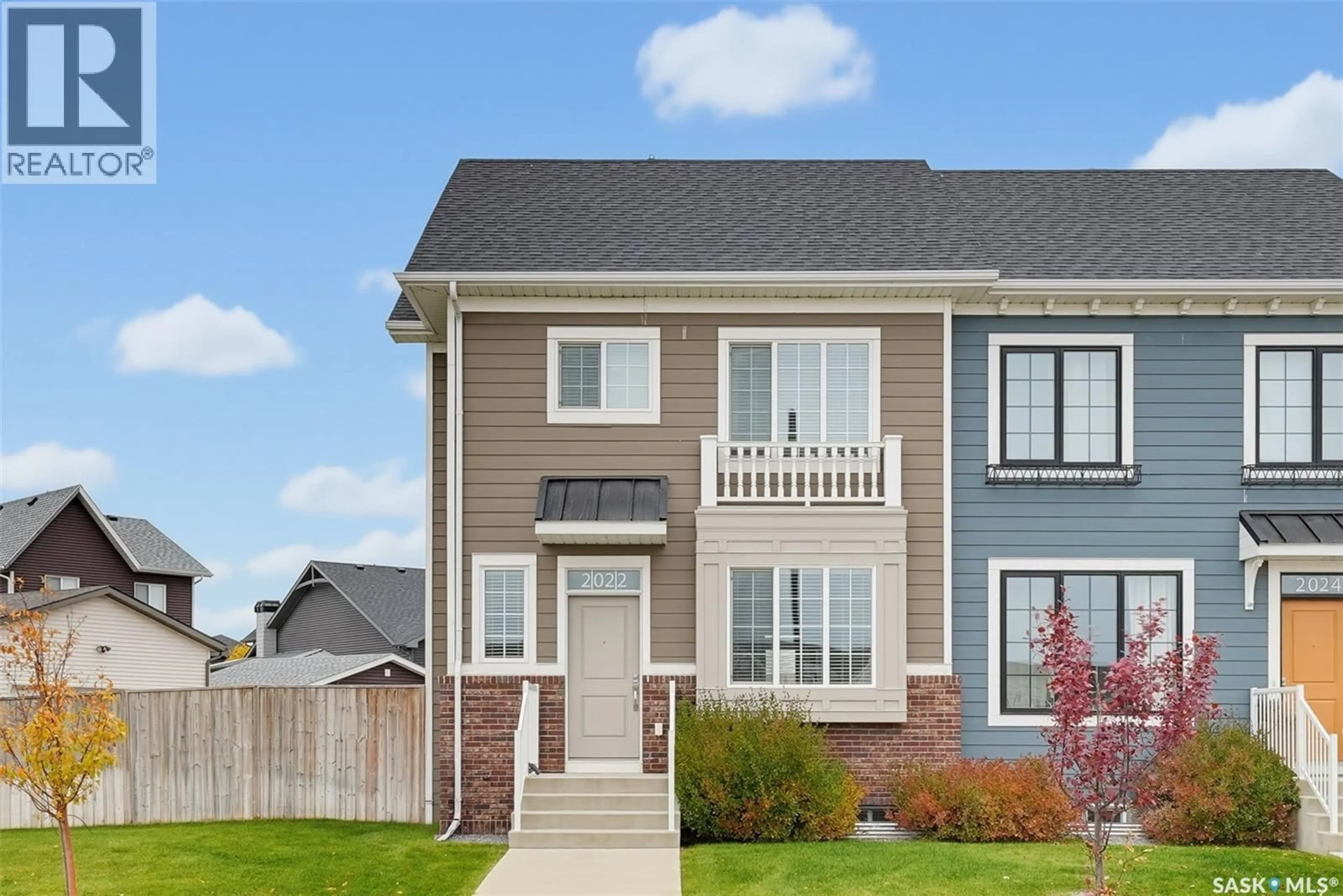 Home with vinyl exterior material, street for 2022 BRIGHTON COMMON, Saskatoon Saskatchewan S7V0M7