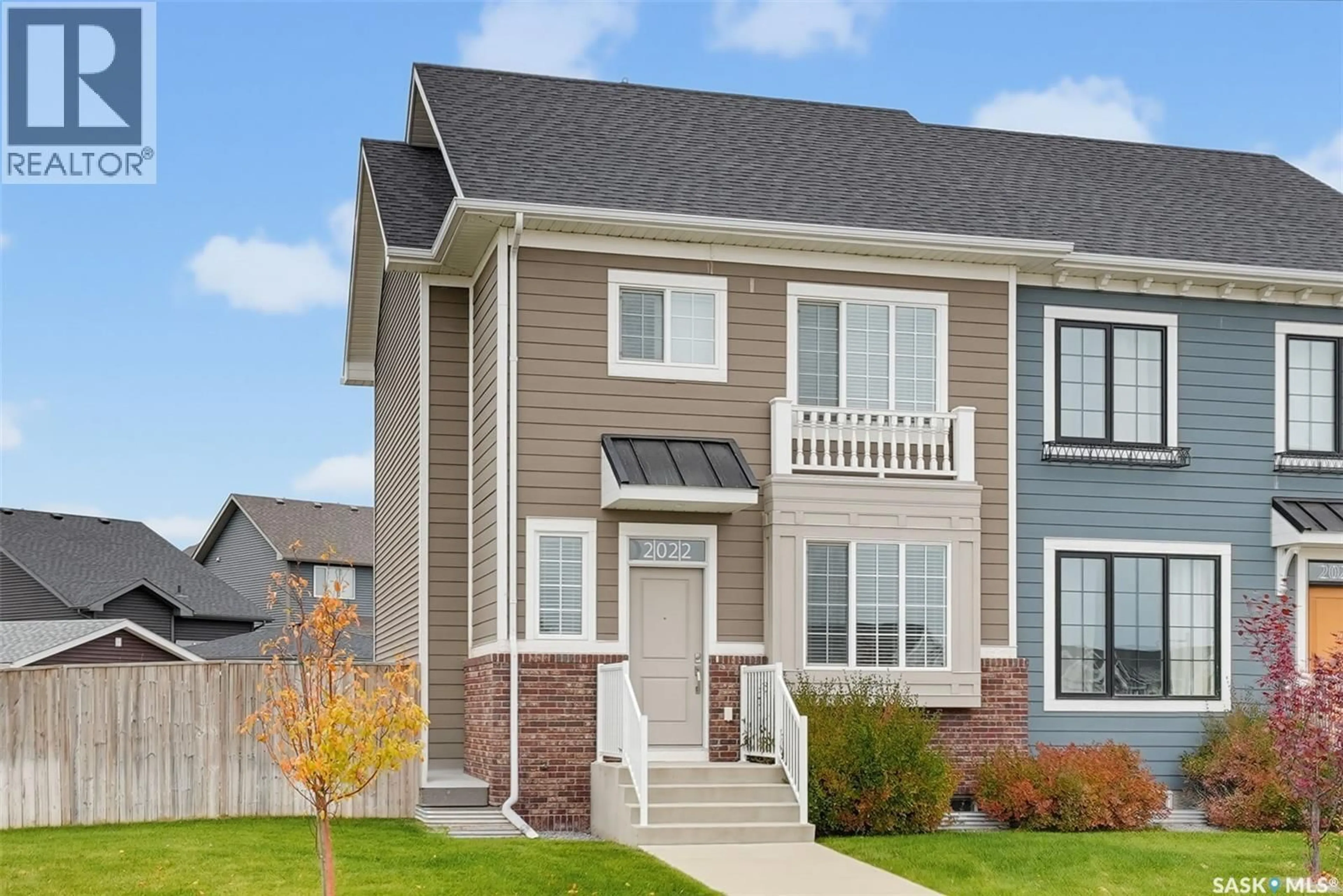 Home with vinyl exterior material, street for 2022 BRIGHTON COMMON, Saskatoon Saskatchewan S7V0M7