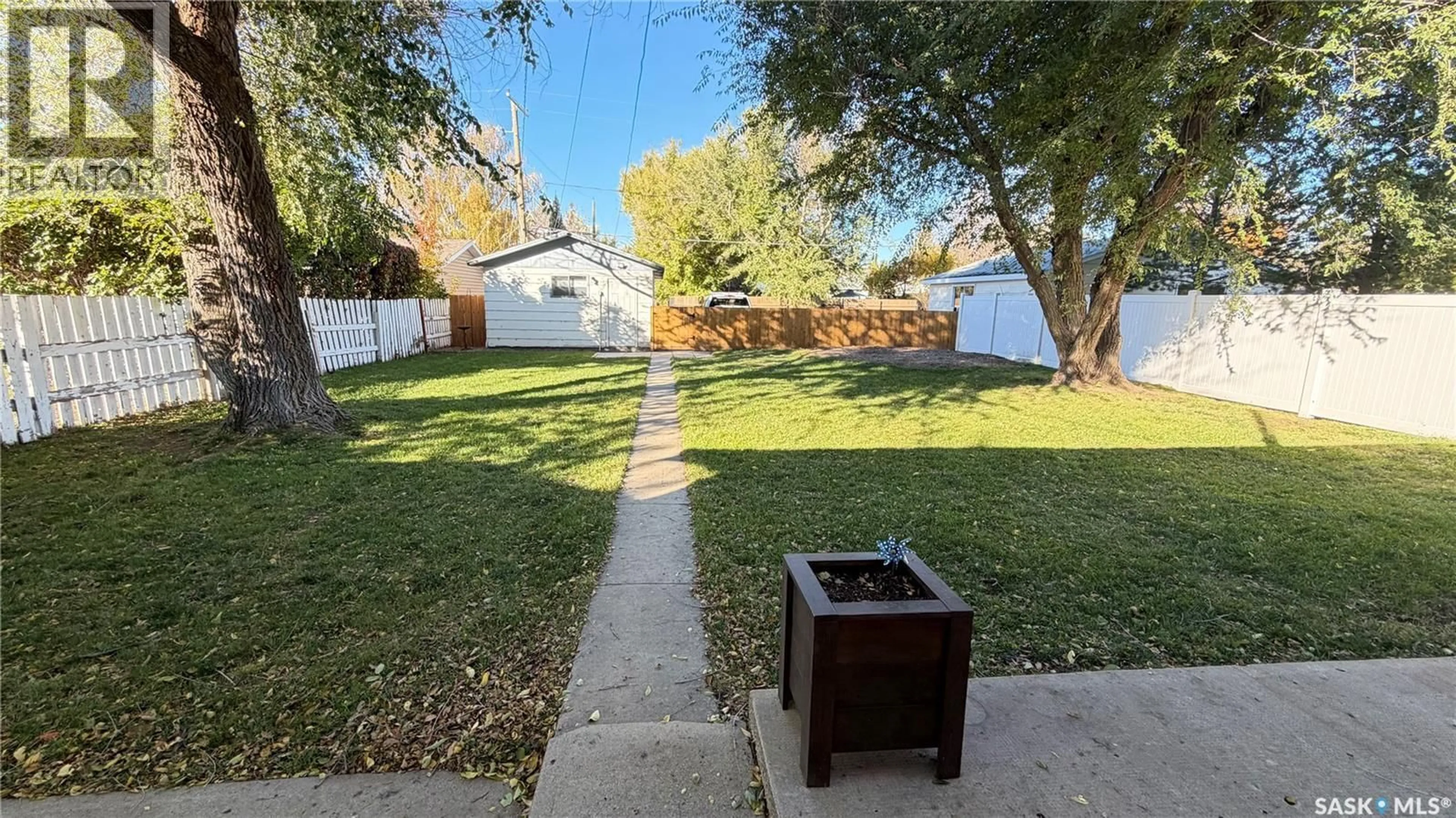 A pic from outside/outdoor area/front of a property/back of a property/a pic from drone, street for 735 JASPER STREET, Maple Creek Saskatchewan S0N1N0