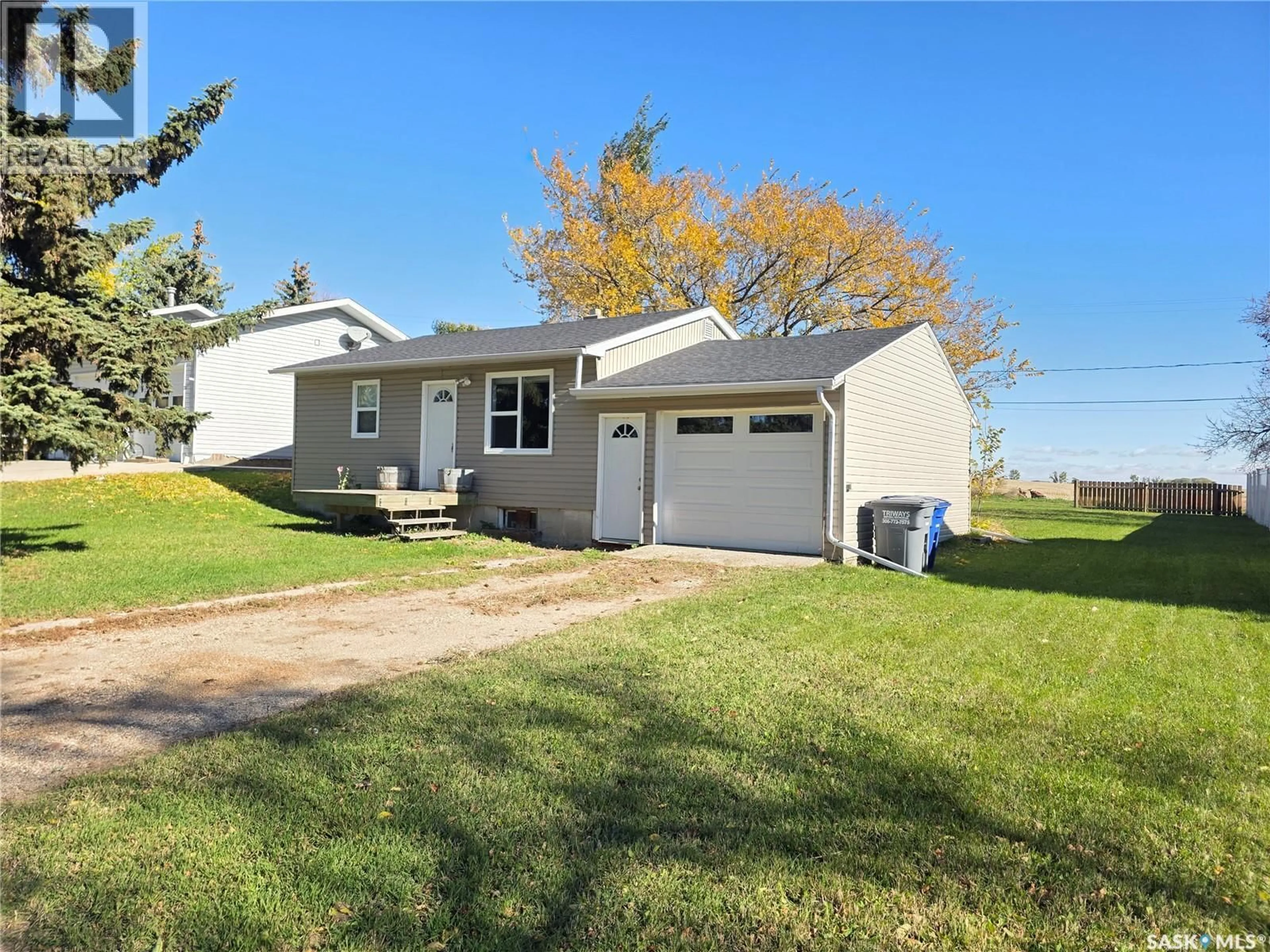 Home with vinyl exterior material, street for 304 2ND STREET, Beechy Saskatchewan S0L0C0