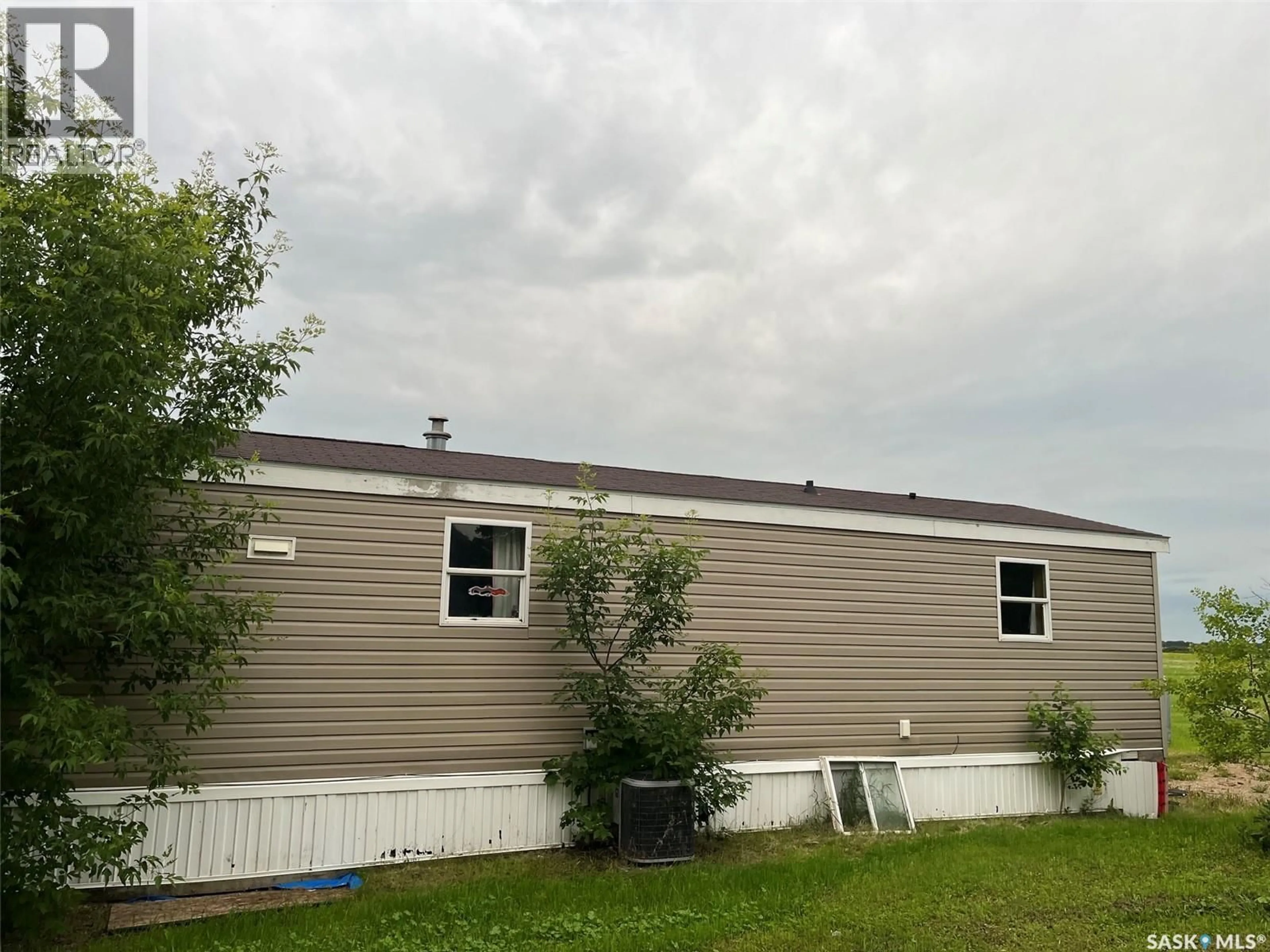 Home with vinyl exterior material, building for 83 106 1ST AVENUE, Weyburn Saskatchewan S4H2J1