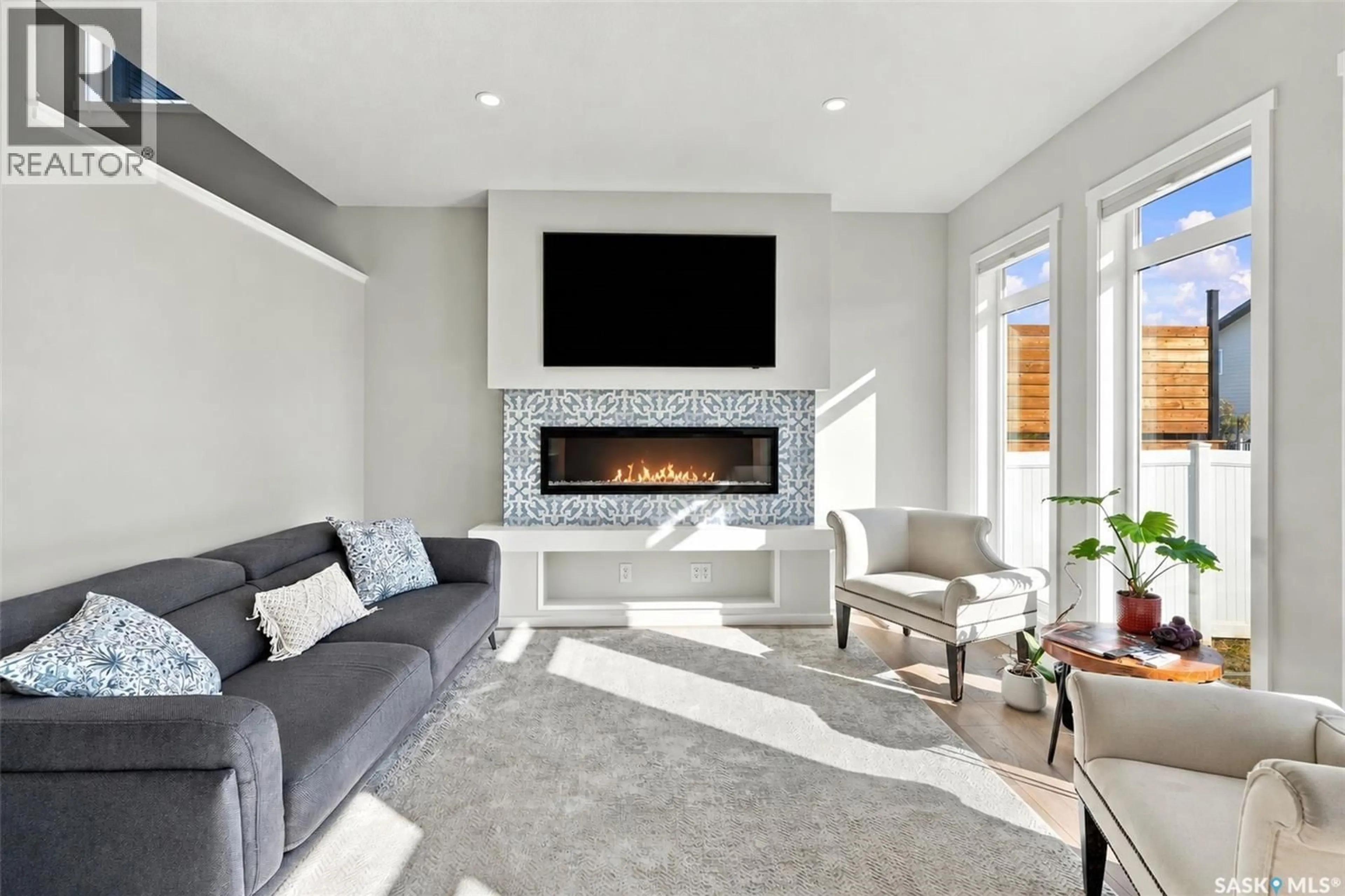 Living room with furniture, unknown for 438 ANISKOTAW WAY, Saskatoon Saskatchewan S7W1M3