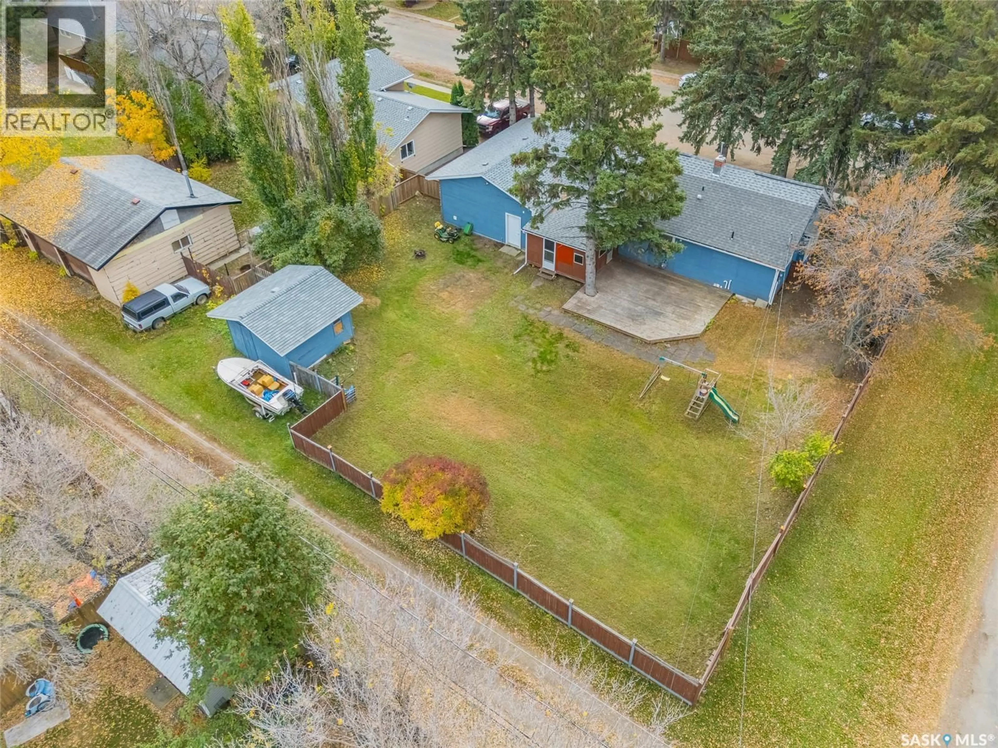 A pic from outside/outdoor area/front of a property/back of a property/a pic from drone, street for 401 2ND STREET E, Langham Saskatchewan S0K2L0