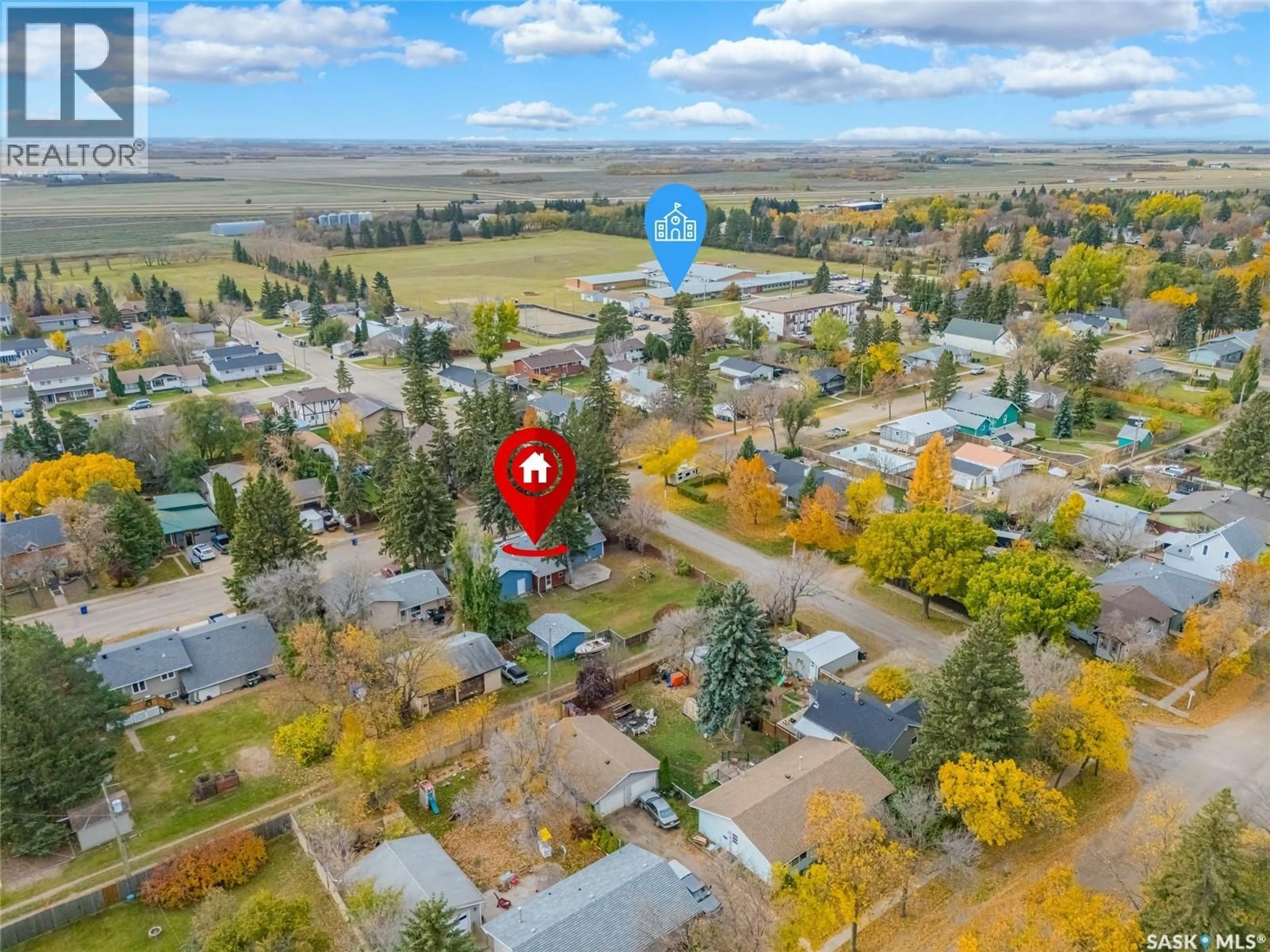 A pic from outside/outdoor area/front of a property/back of a property/a pic from drone, street for 401 2ND STREET E, Langham Saskatchewan S0K2L0