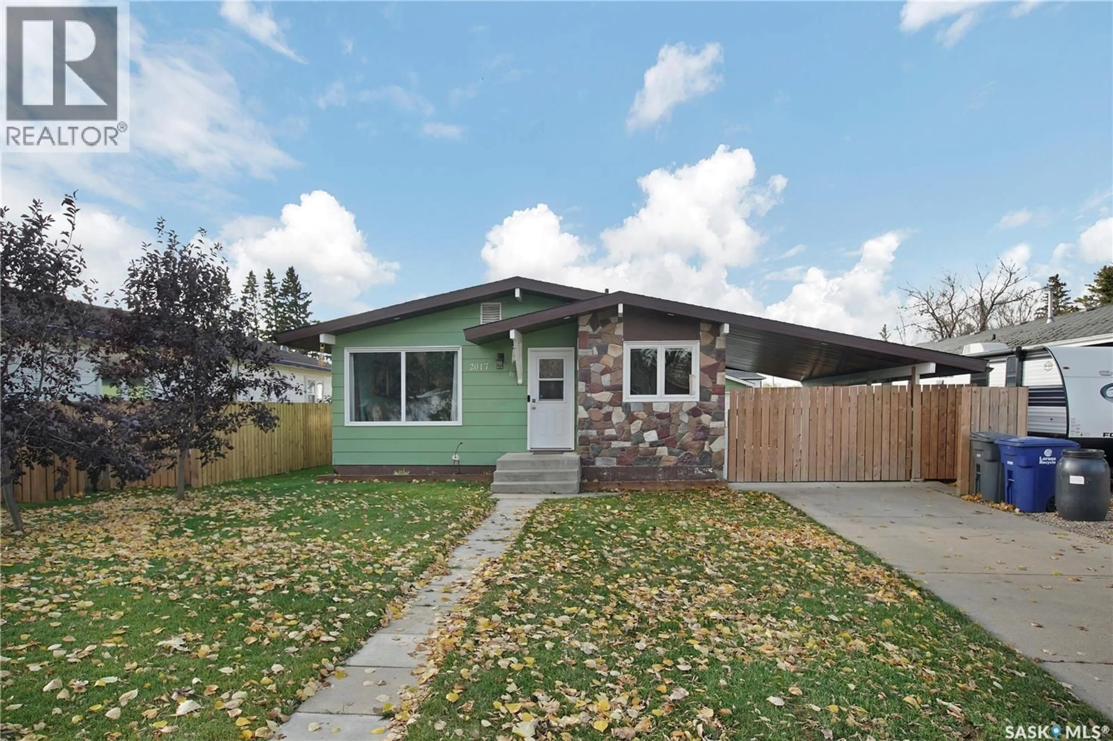 Home with vinyl exterior material, street for 2017 9TH STREET, Rosthern Saskatchewan S0K4R0