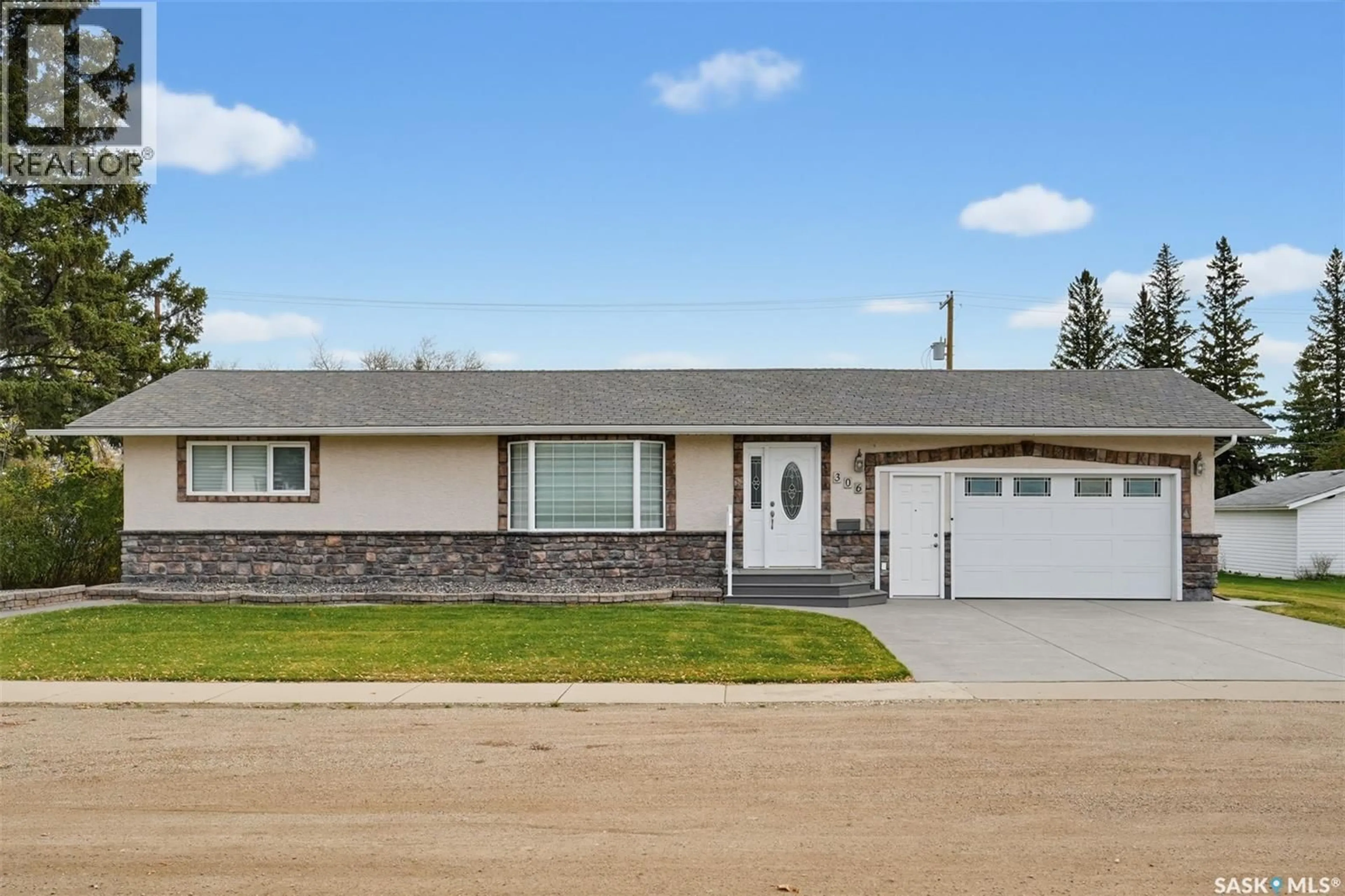 Home with vinyl exterior material, street for 306 3RD STREET, Vonda Saskatchewan S0K4N0