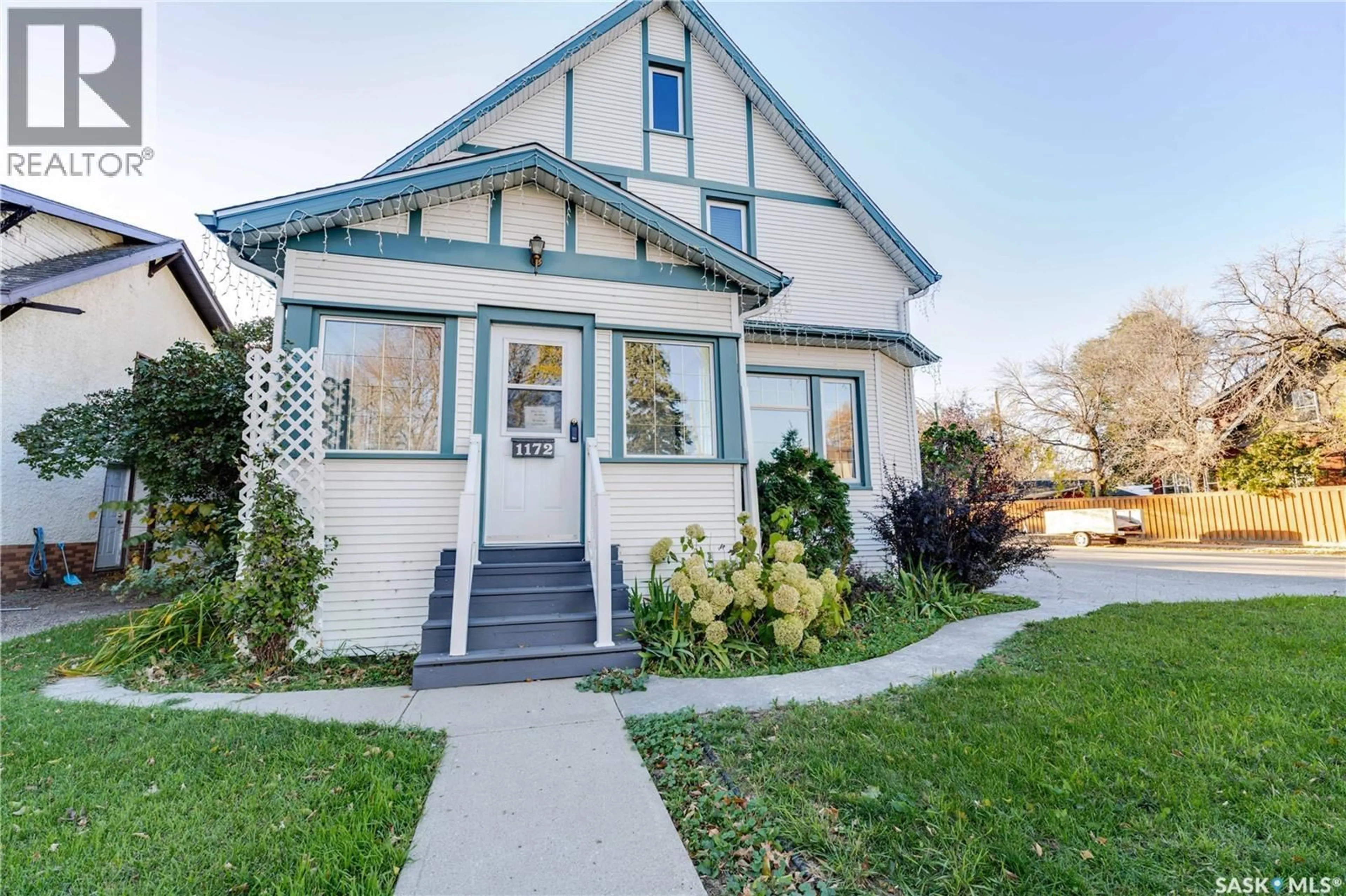 Home with vinyl exterior material, street for 1172 CLIFTON AVENUE, Moose Jaw Saskatchewan S6H3L5
