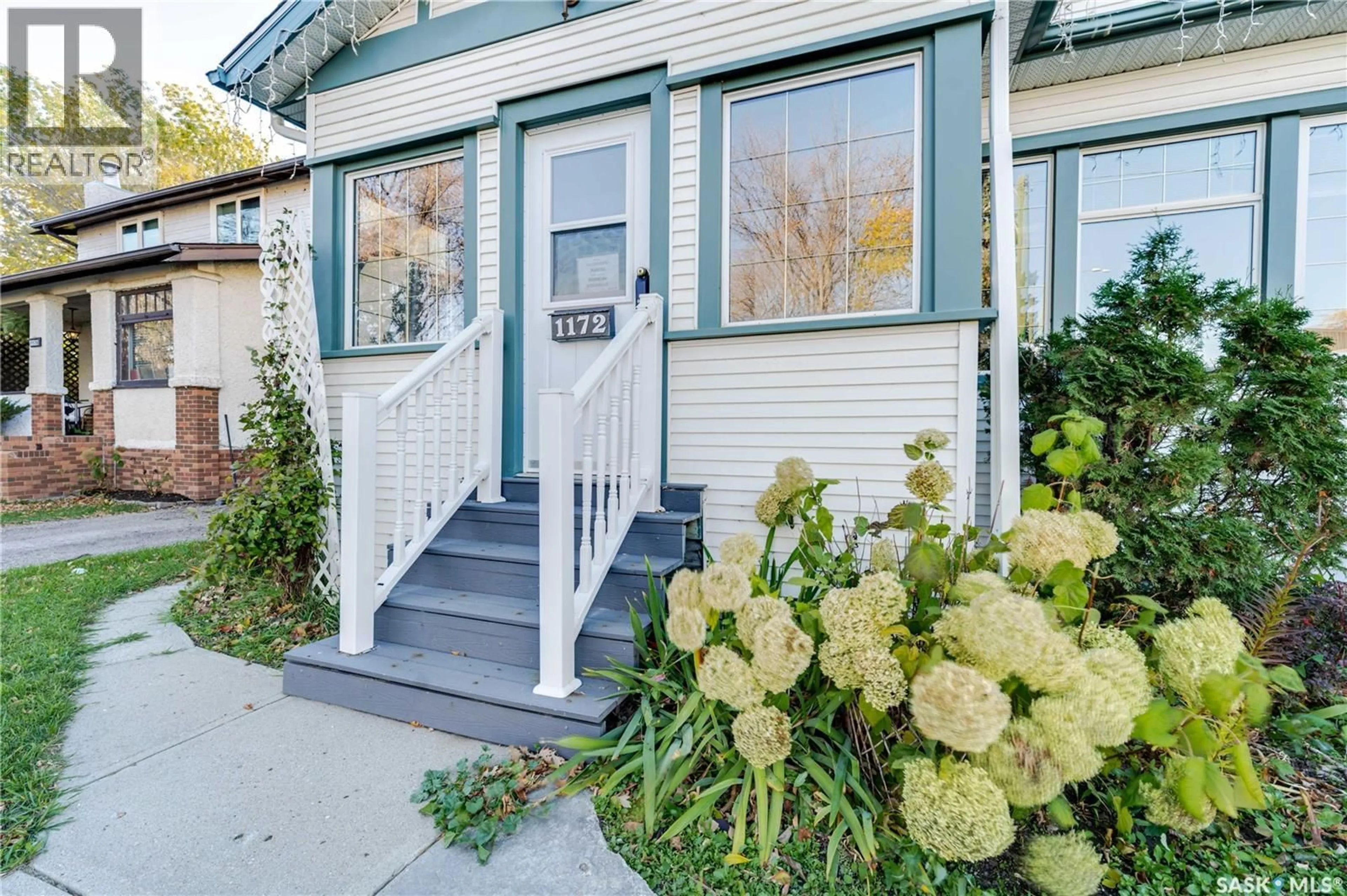 Home with vinyl exterior material, street for 1172 CLIFTON AVENUE, Moose Jaw Saskatchewan S6H3L5