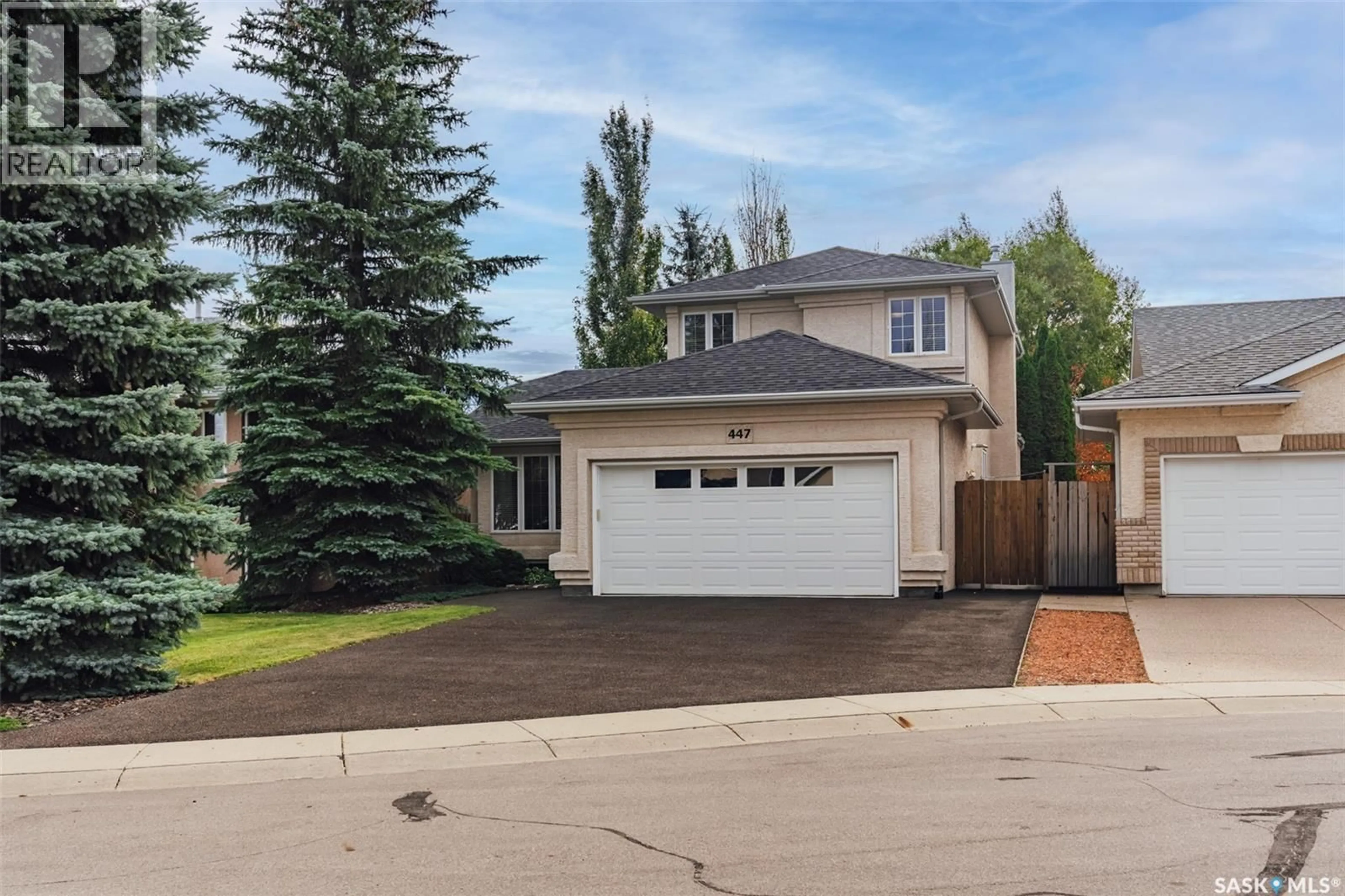 Home with vinyl exterior material, street for 447 BRIARVALE COURT, Saskatoon Saskatchewan S7V1B8