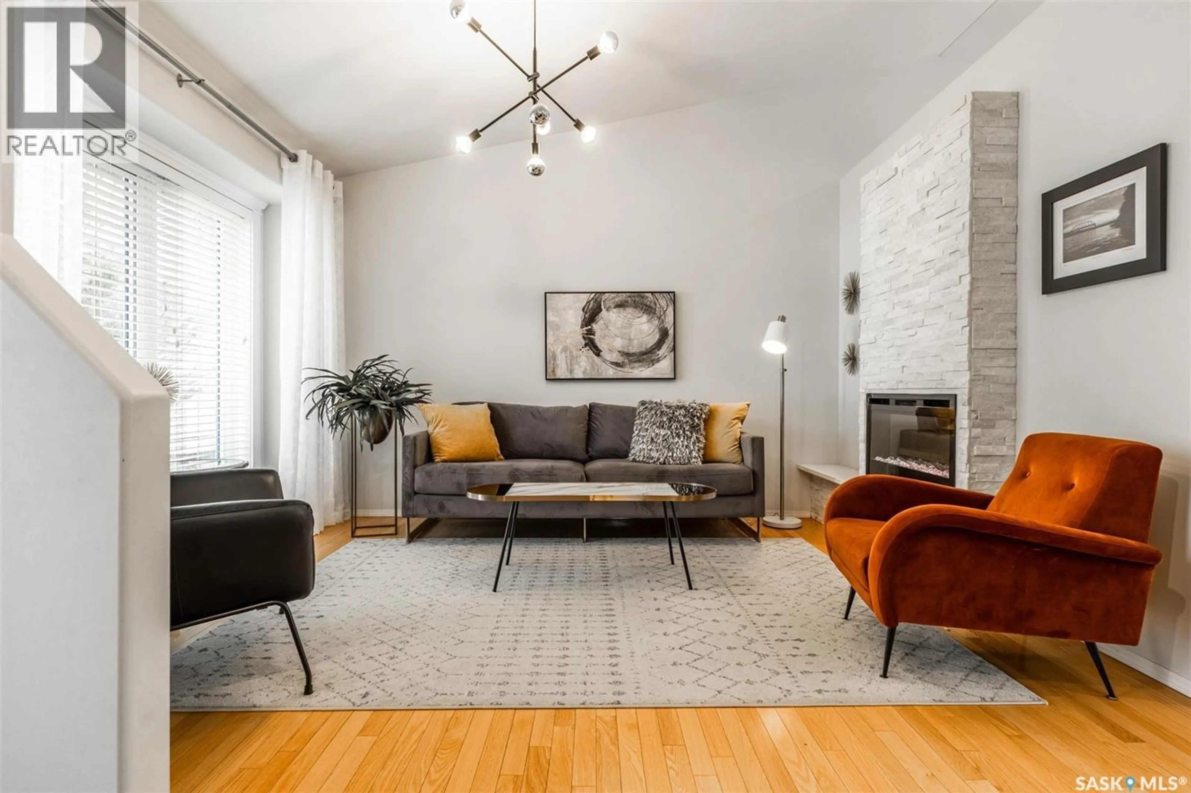 Living room with furniture, unknown for 447 BRIARVALE COURT, Saskatoon Saskatchewan S7V1B8