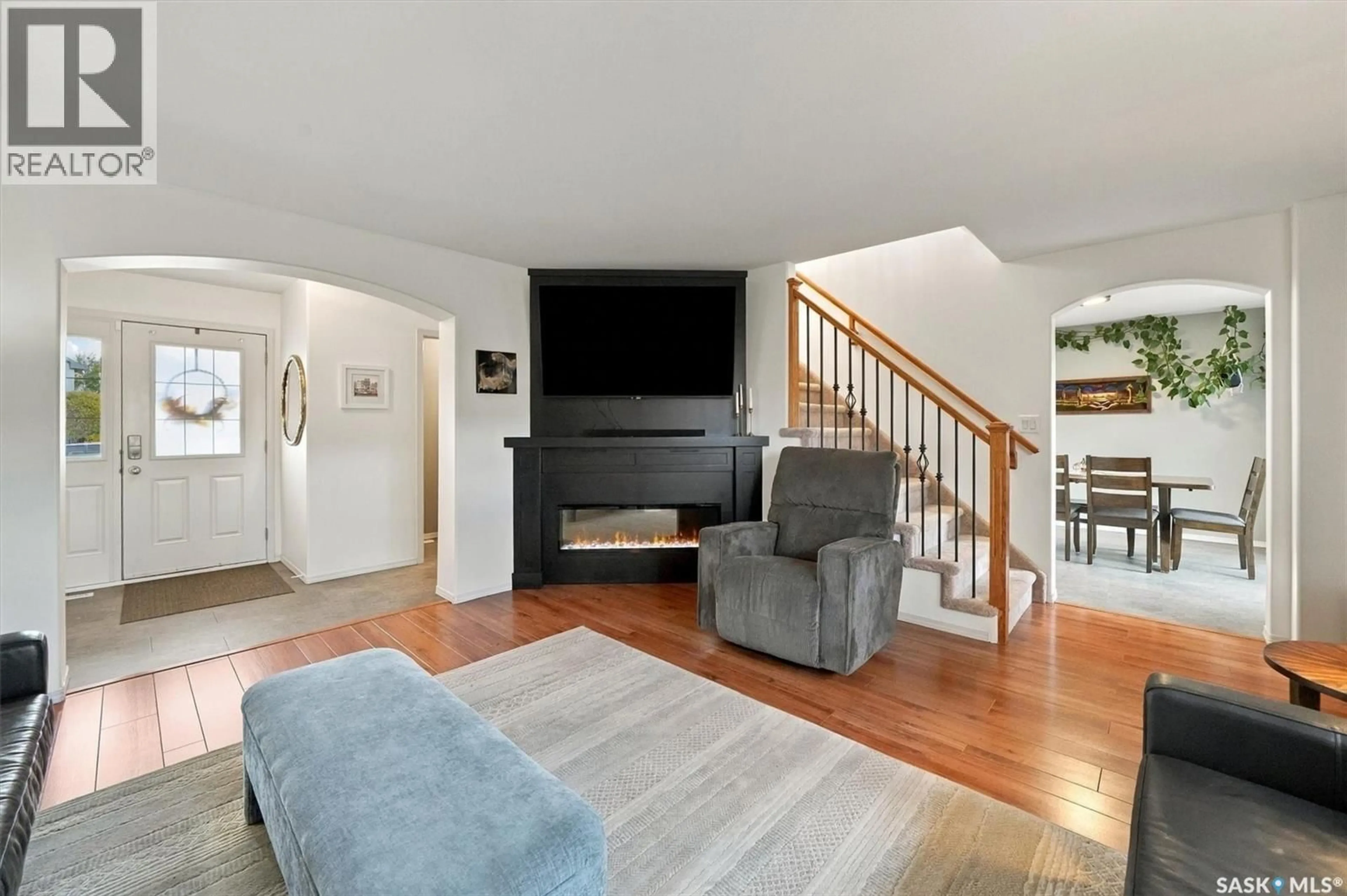 Living room with furniture, unknown for 311 DENHAM COURT, Saskatoon Saskatchewan S7R1E5