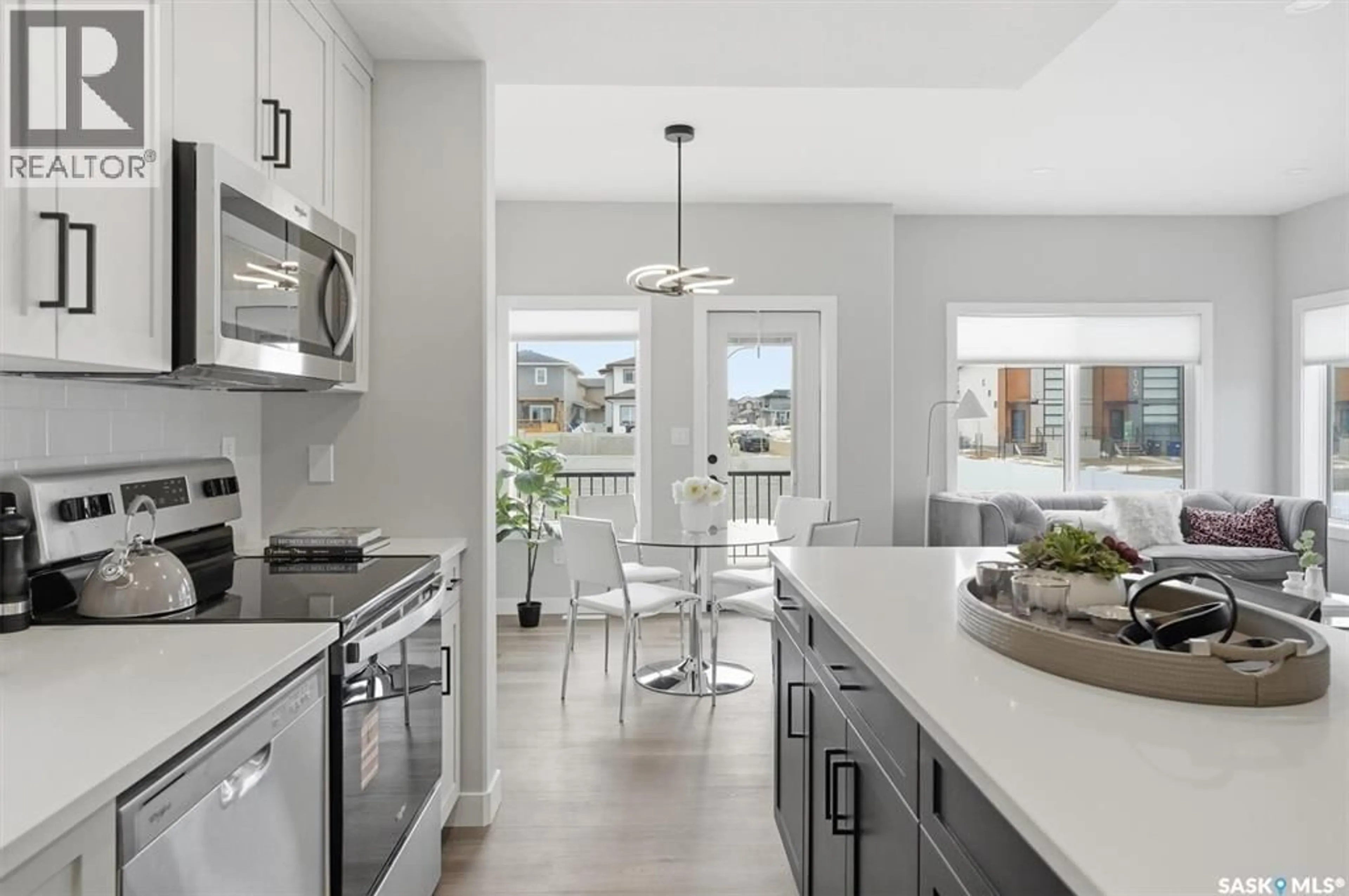 Open concept kitchen, ceramic/tile floor for 134 ASOKANIHKEW WAY, Saskatoon Saskatchewan S7V2C3