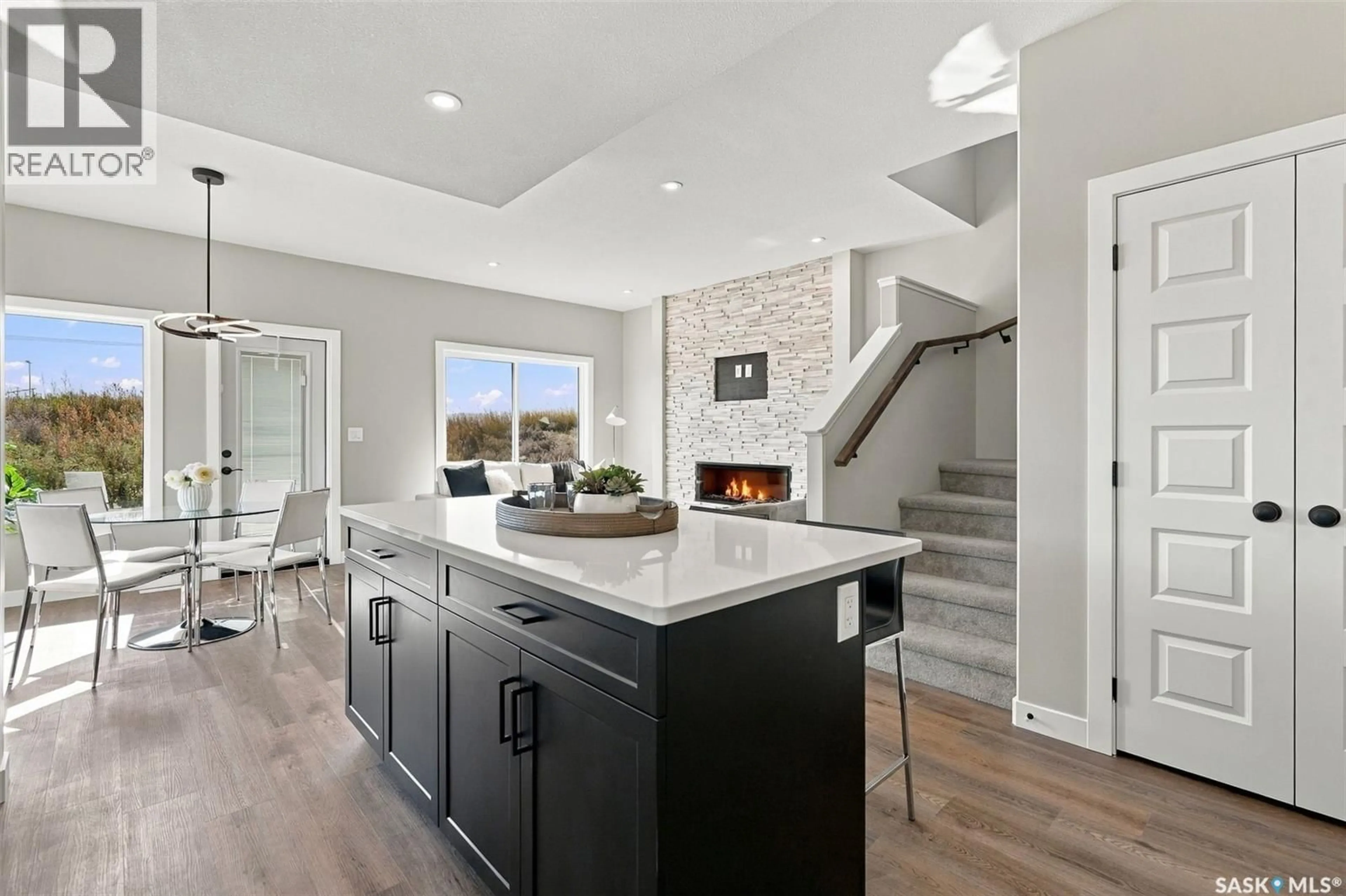 Open concept kitchen, ceramic/tile floor for 106 ASOKANIHKEW WAY, Saskatoon Saskatchewan S7V2C3