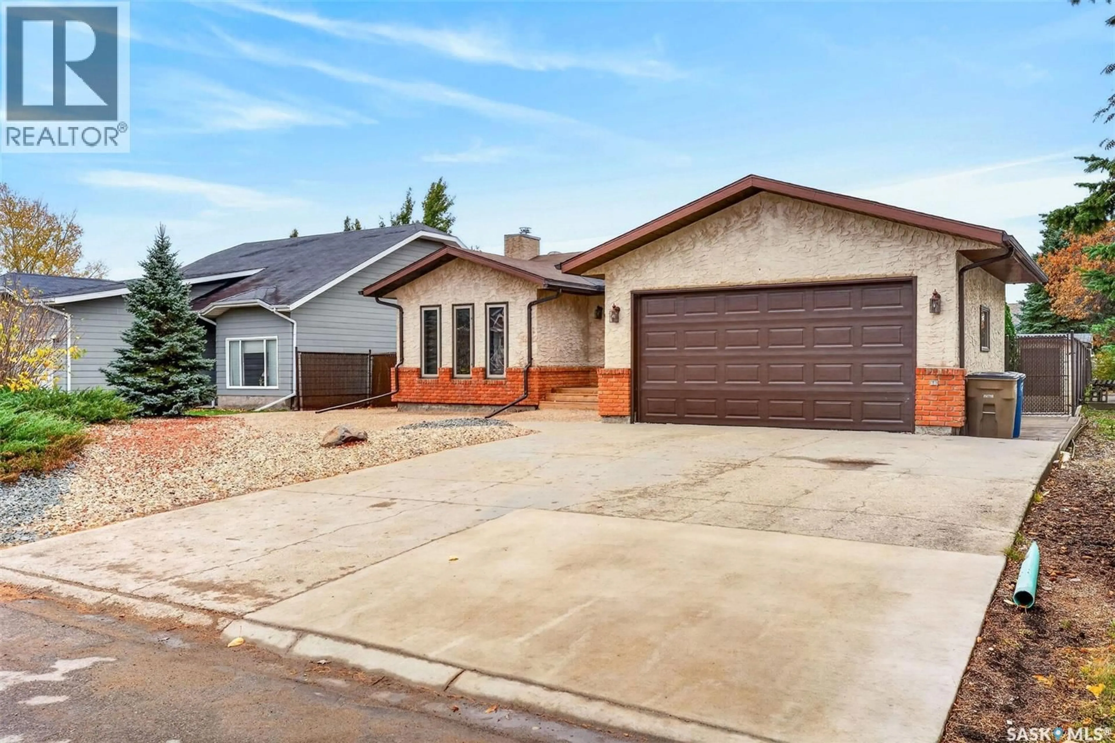 Home with brick exterior material, street for 718 GOLBURN CRESCENT, Tisdale Saskatchewan S0E1T0