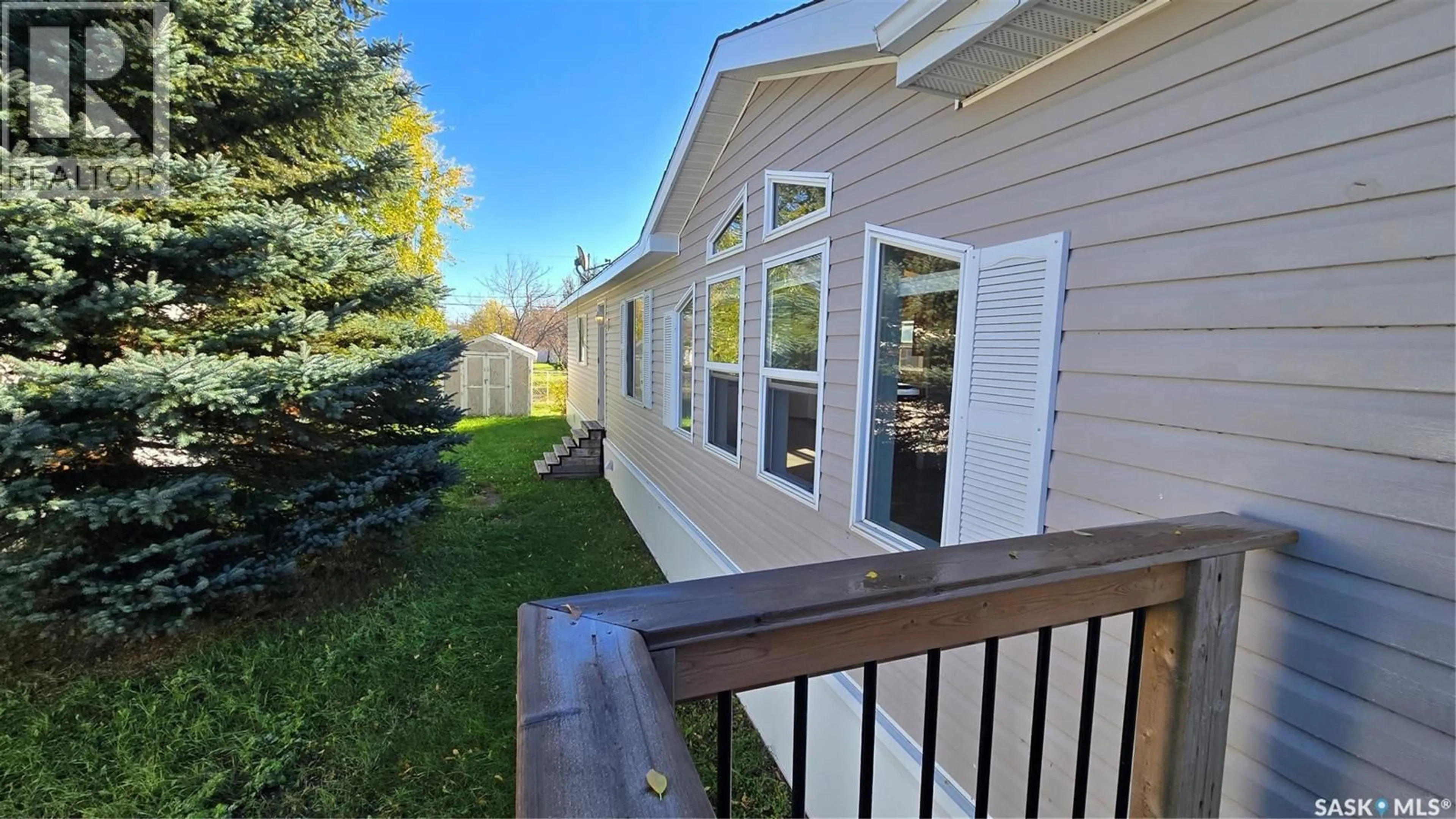 Home with vinyl exterior material, water/lake/river/ocean view for 16 WALTERS COURT, Pilot Butte Saskatchewan S0G3Z0