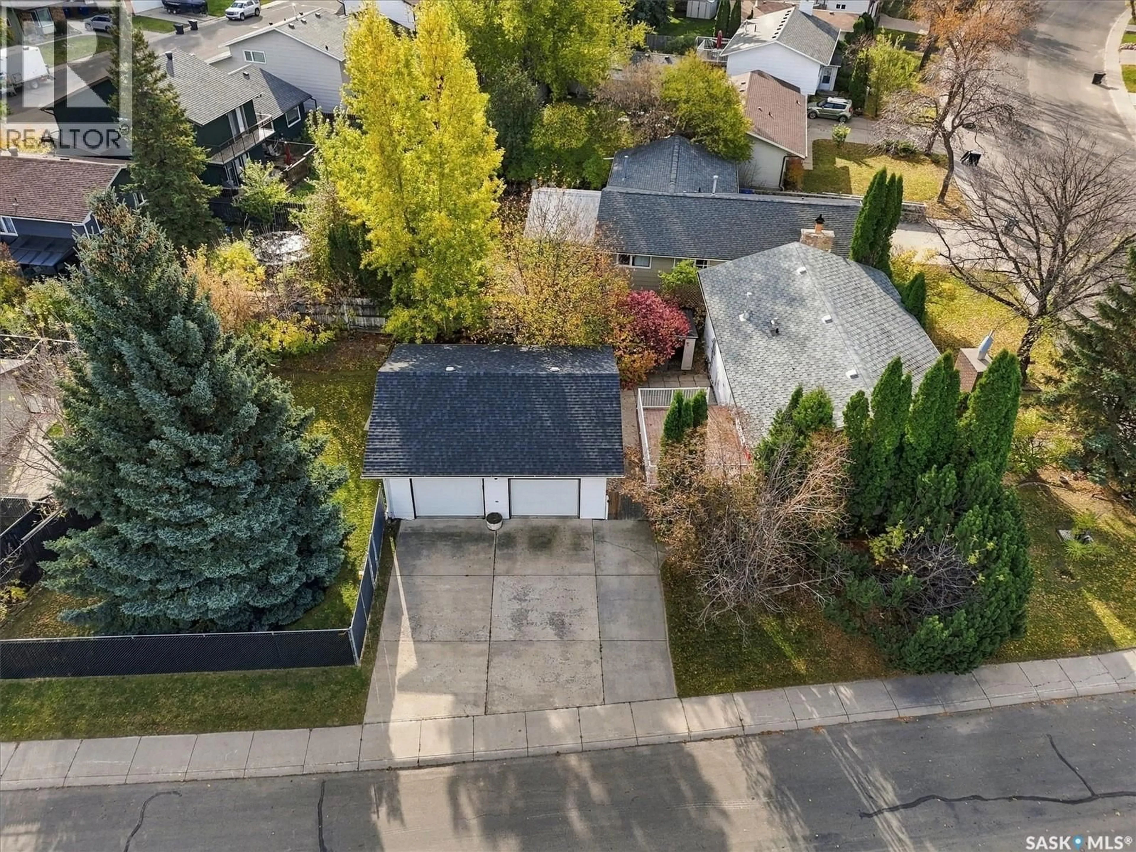 A pic from outside/outdoor area/front of a property/back of a property/a pic from drone, street for 647 REDBERRY ROAD, Saskatoon Saskatchewan S7K4S4