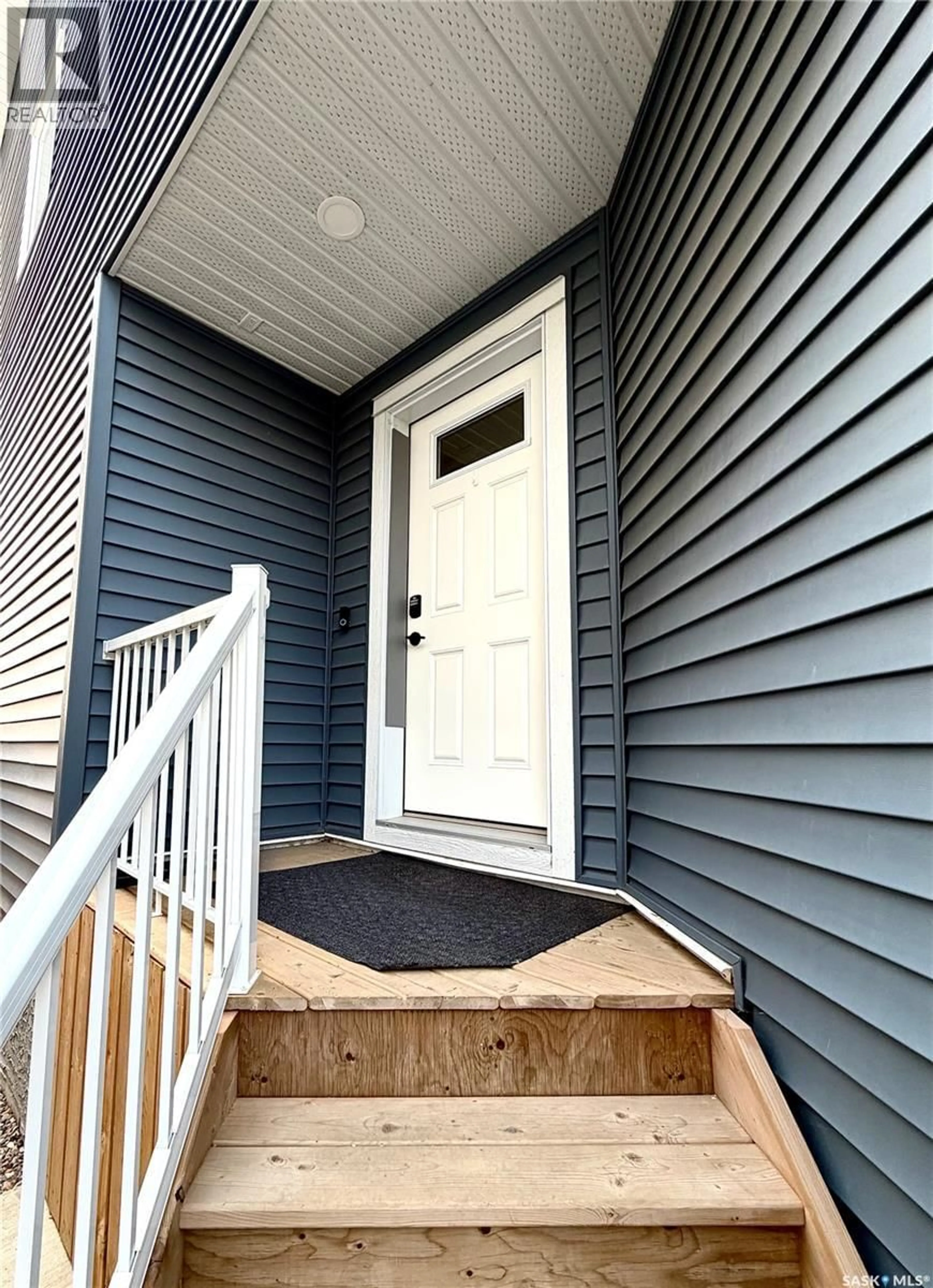 Home with vinyl exterior material, street for 114 COWESSESS ROAD, Saskatoon Saskatchewan S7V1S3