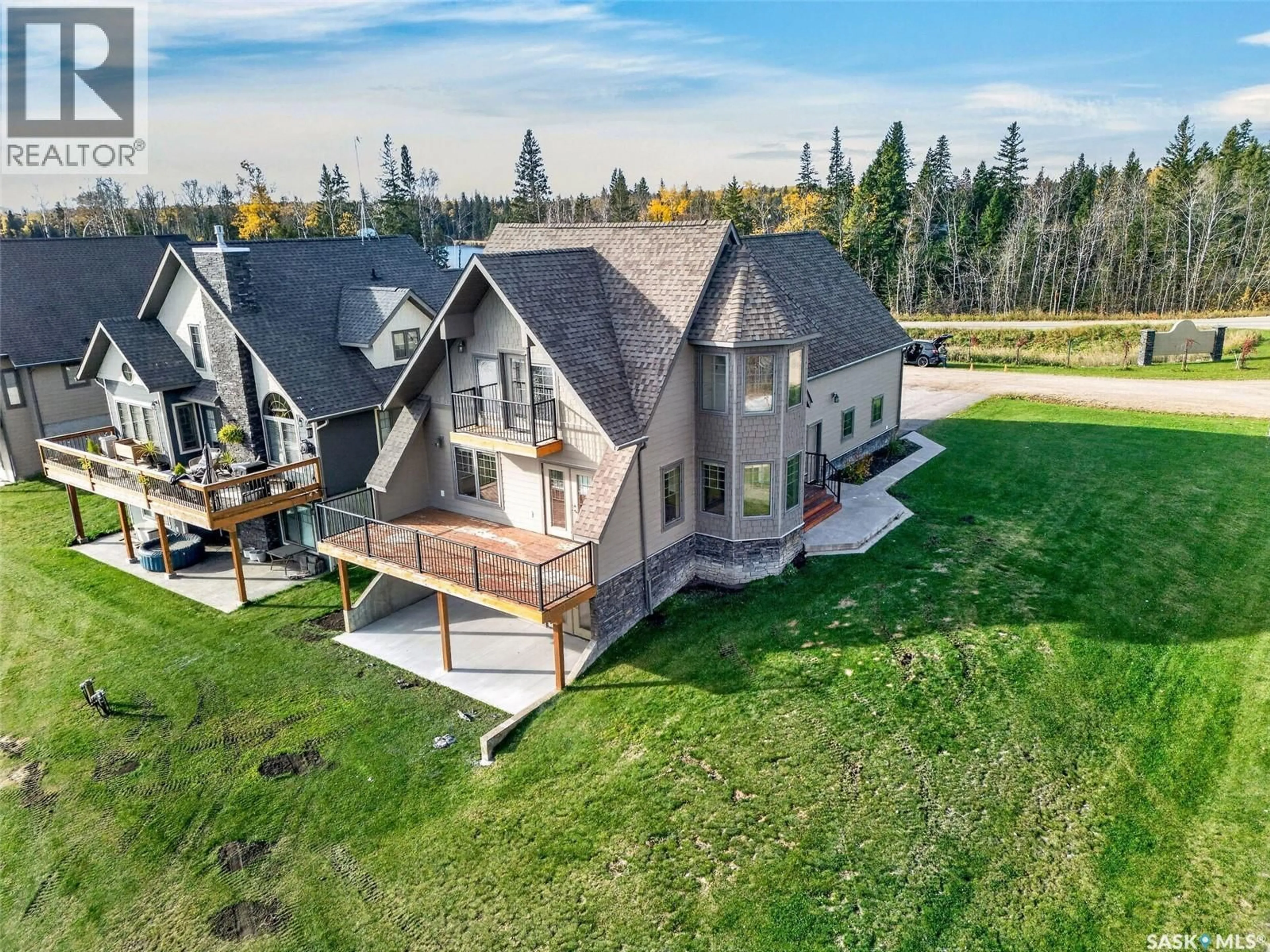 A pic from outside/outdoor area/front of a property/back of a property/a pic from drone, unknown for 1 - 101 NEIS ACCESS ROAD, Emma Lake Saskatchewan S0J0N0
