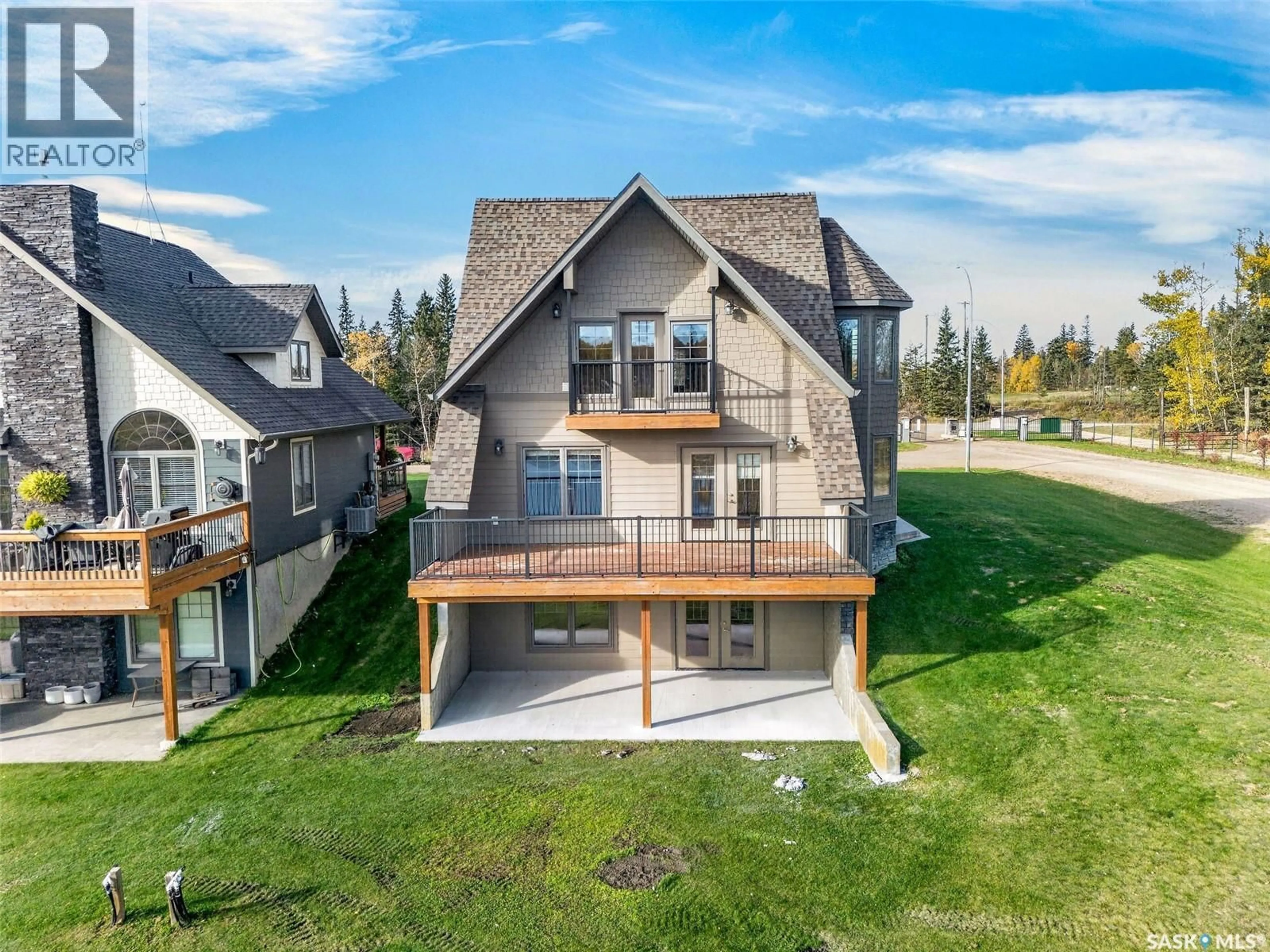 A pic from outside/outdoor area/front of a property/back of a property/a pic from drone, mountain view for 1 - 101 NEIS ACCESS ROAD, Emma Lake Saskatchewan S0J0N0