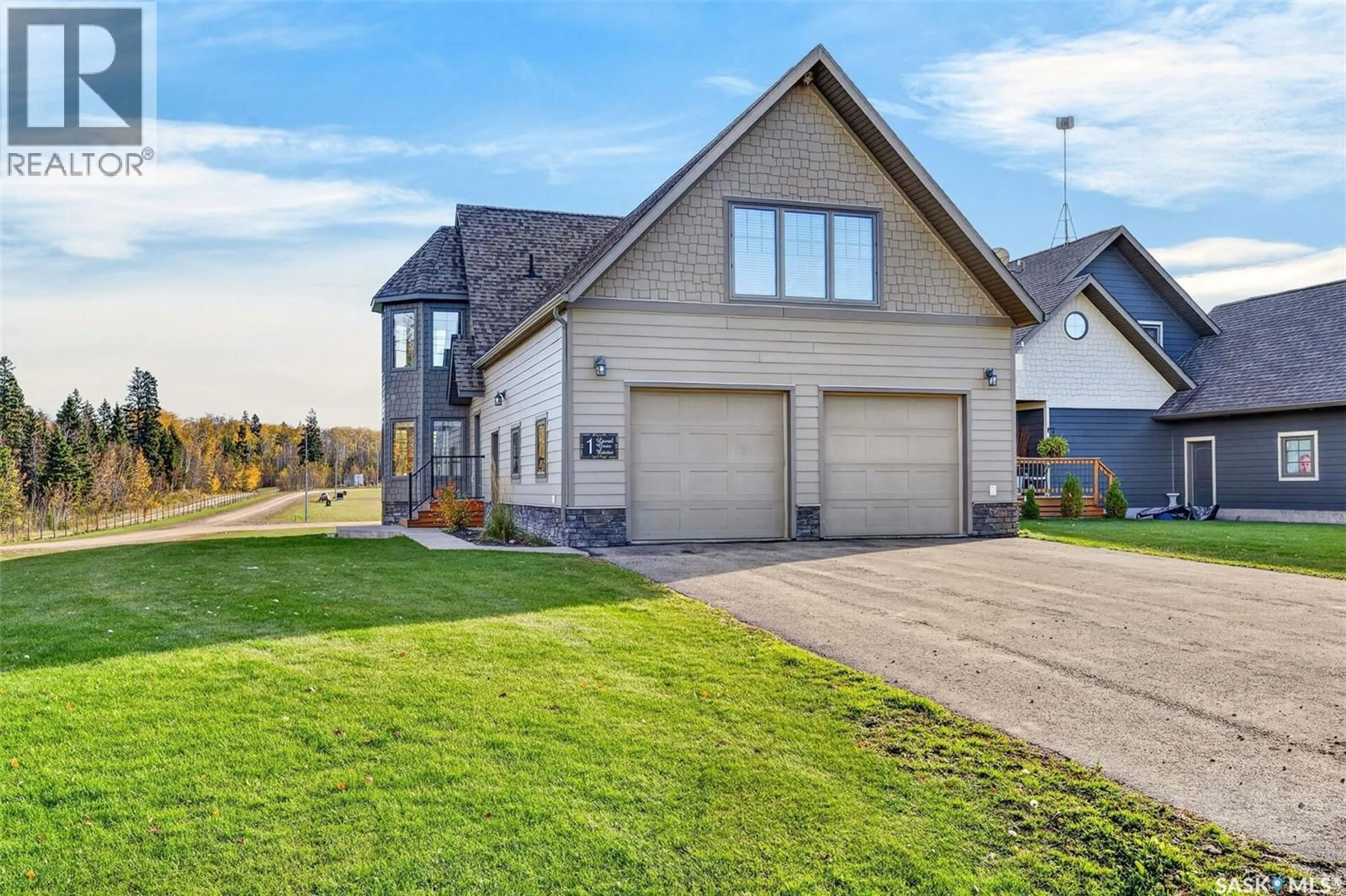 Home with vinyl exterior material, street for 1 - 101 NEIS ACCESS ROAD, Emma Lake Saskatchewan S0J0N0