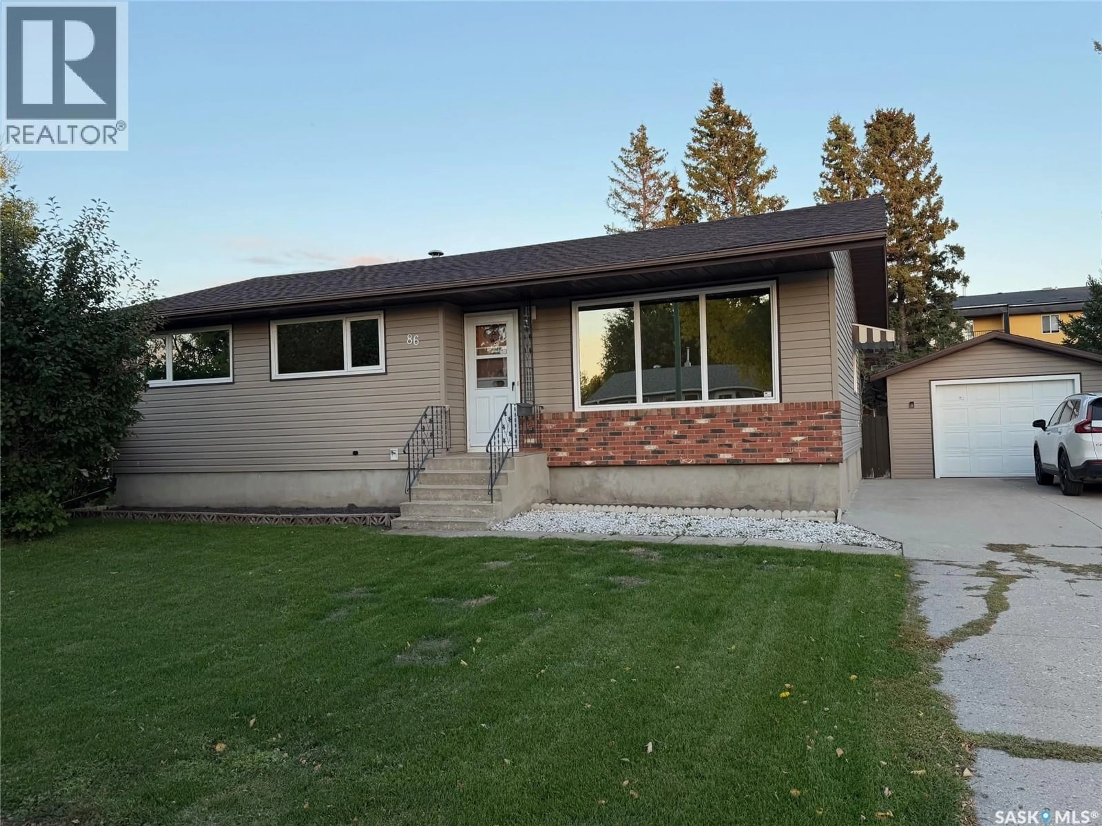 Home with vinyl exterior material, street for 86 NEWFIELD PLACE, Yorkton Saskatchewan S3N2M9
